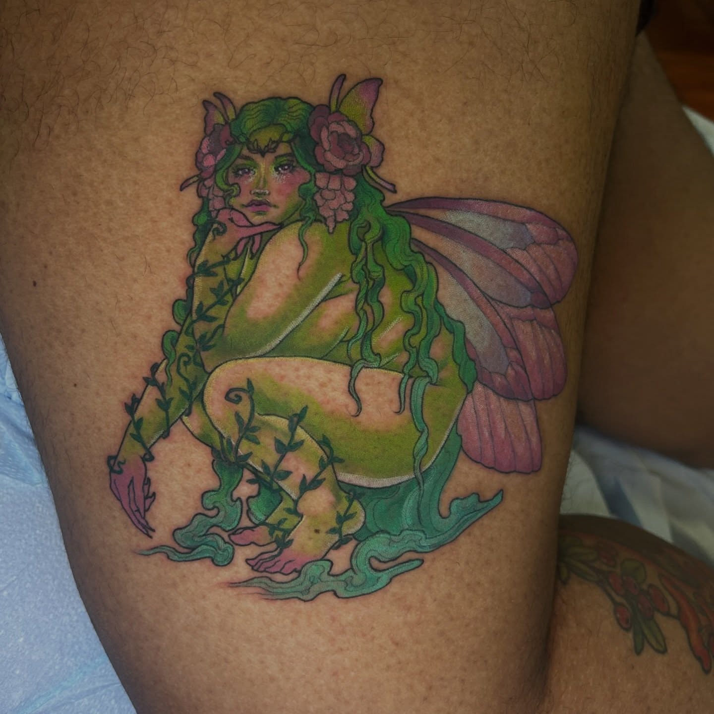 Fairy new school tattoo on the thigh by Anna Sylvan Tattoos