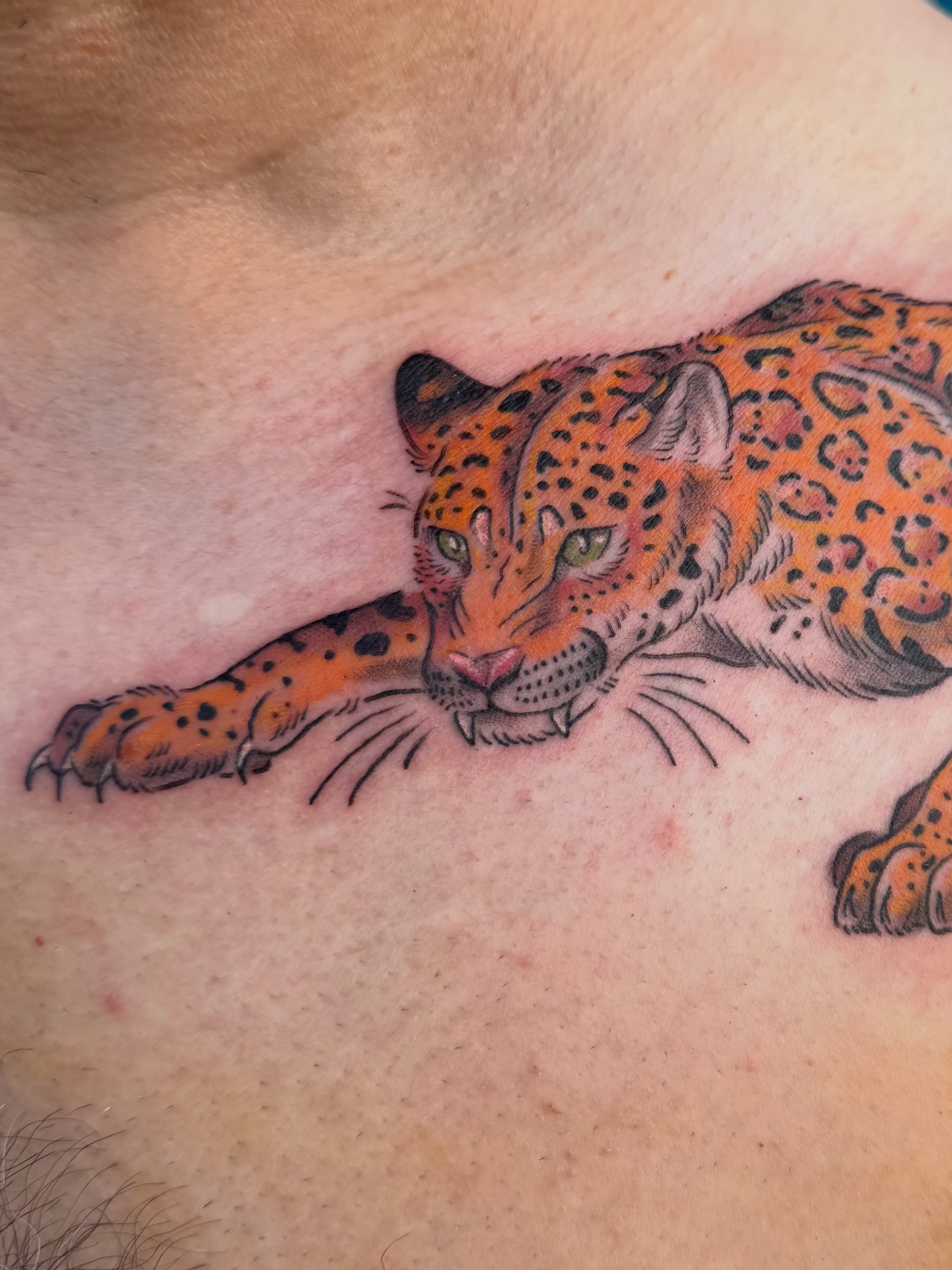 Leopard realism tattoo on the chest by Roswell Orellana 👽🛸