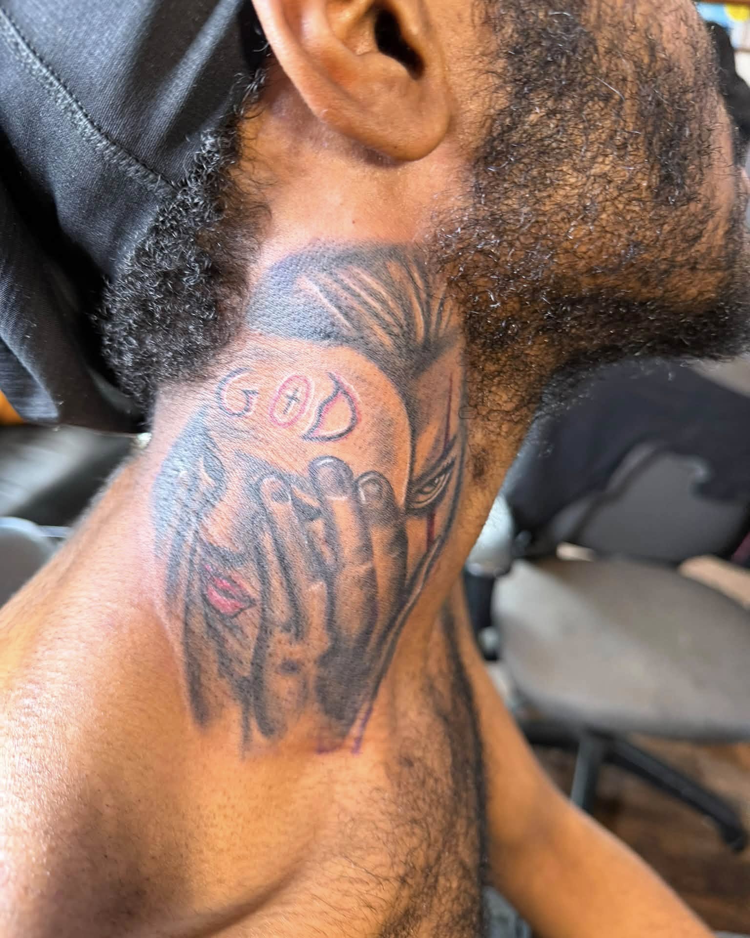 Praying hands American traditional tattoo on the neck by Don Juan Ink Therapy, Jamesburg, New Jersey