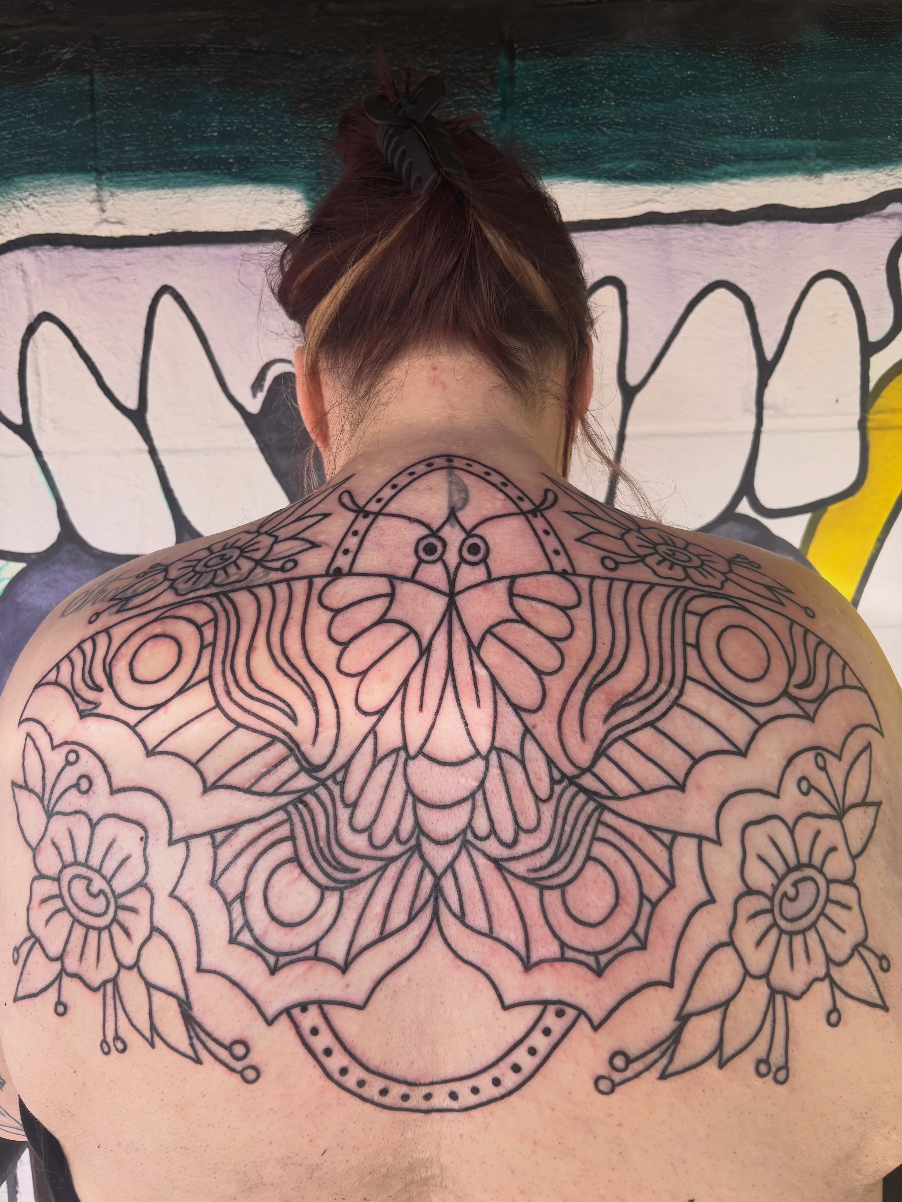 Butterfly ornamental tattoo on the back by Alex Green, Nashville, Tennessee