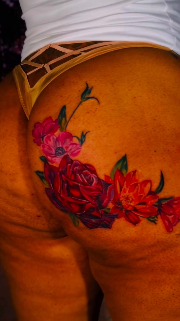 Floral arrangement realism tattoo by Colorful Tattoos by Cody Dean