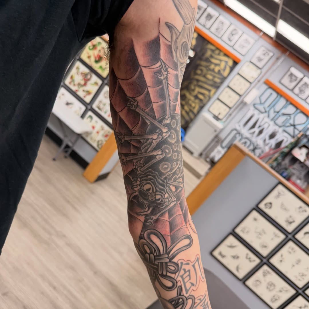 Sword and dragon American traditional tattoo on the forearm by Franky Sharpz