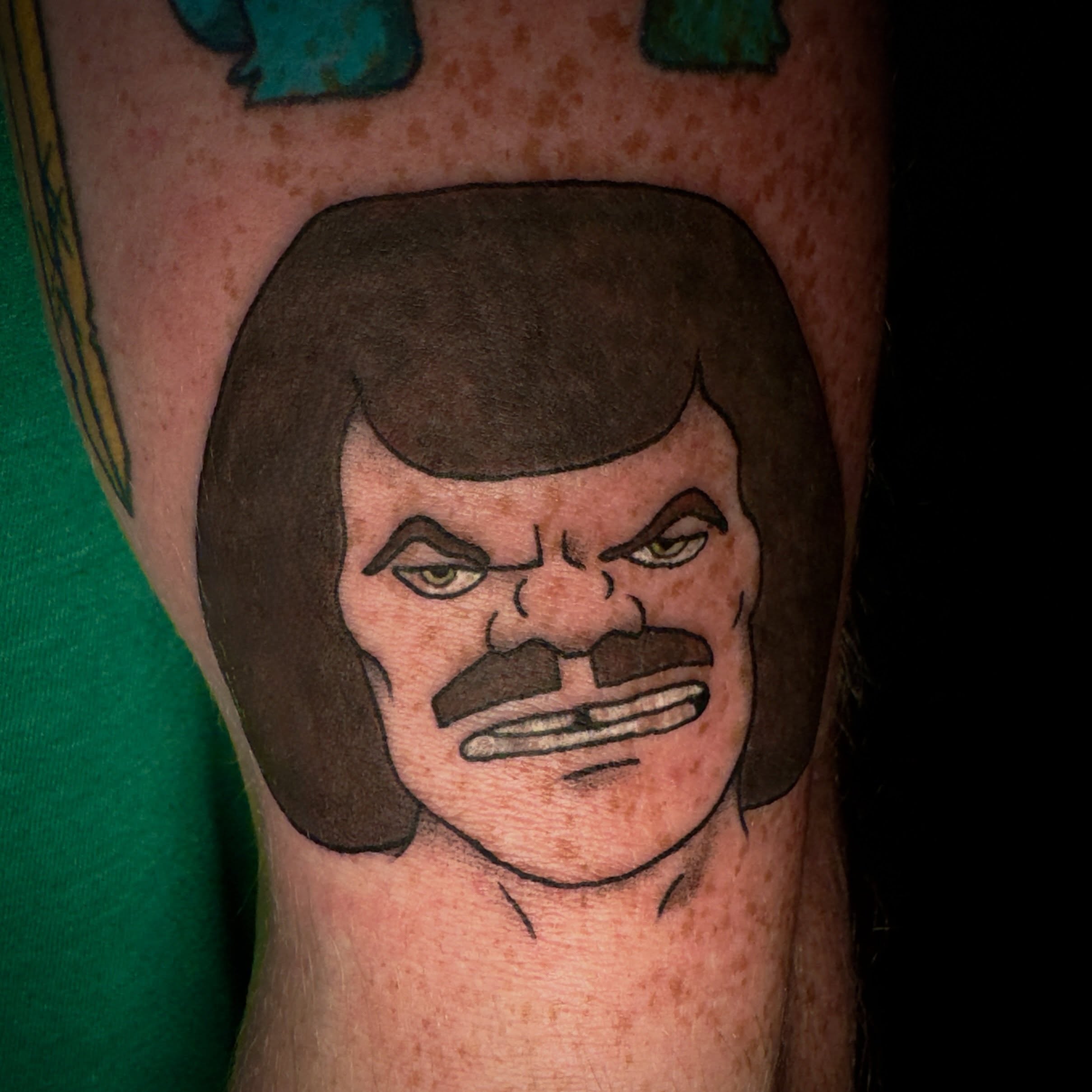 Angry man realism tattoo on the forearm by Seth Christianson