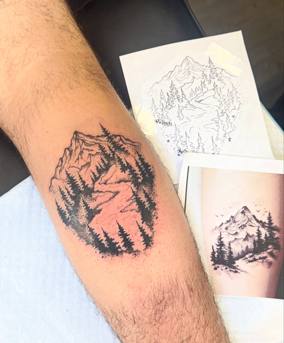 Mountain landscape dotwork tattoo on the forearm by Tyla Pistak, Seattle, Washington