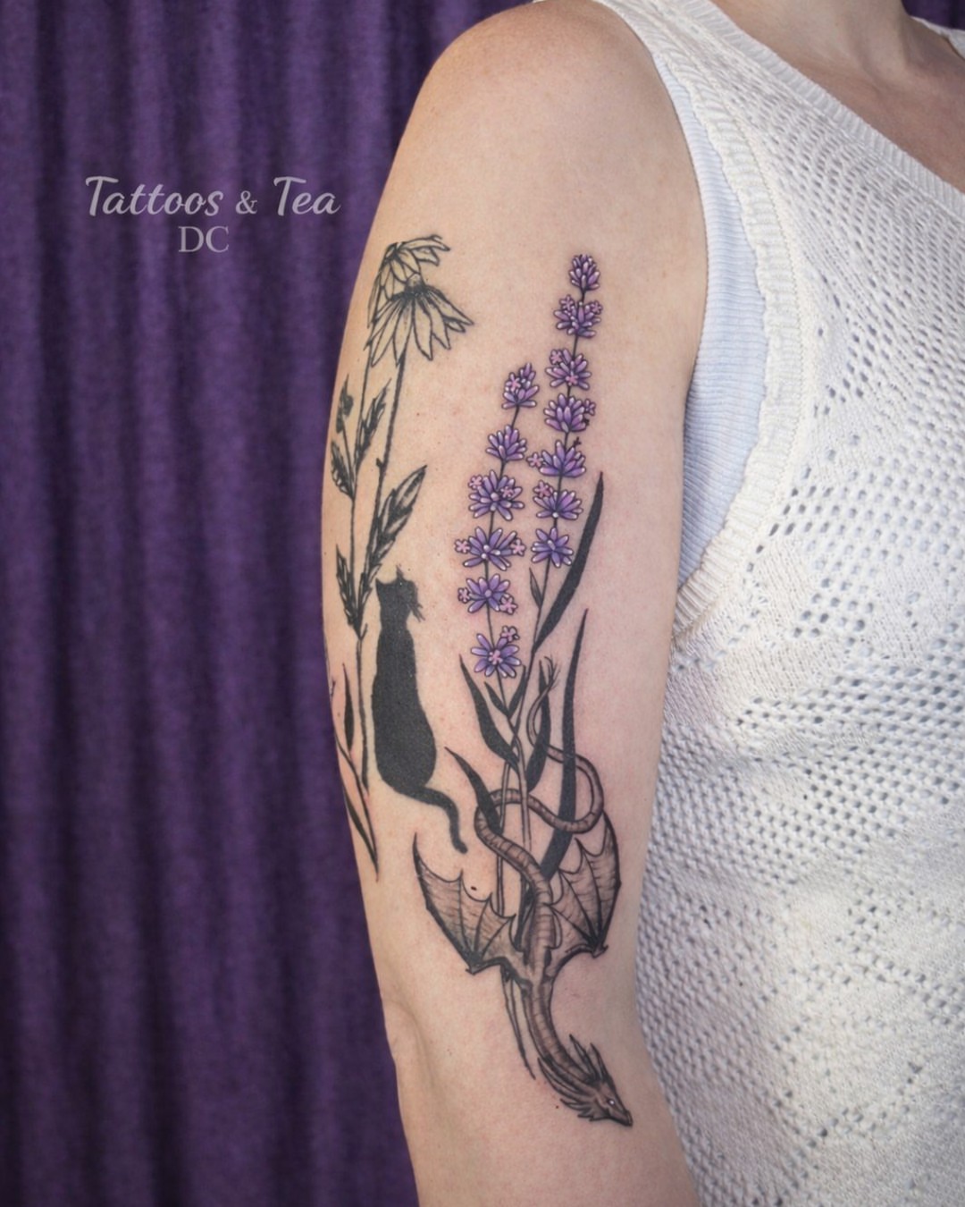 Cat and dragon realism tattoo on the forearm by Tattoos & Tea DC, Arlington, Virginia