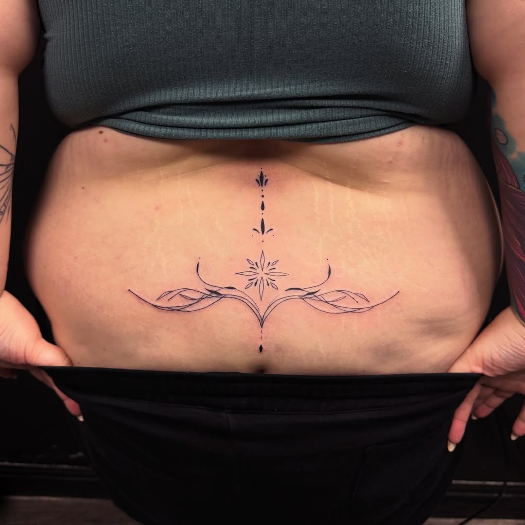 Geometric design geometric tattoo on the torso by Pretty Ugly Tattoos