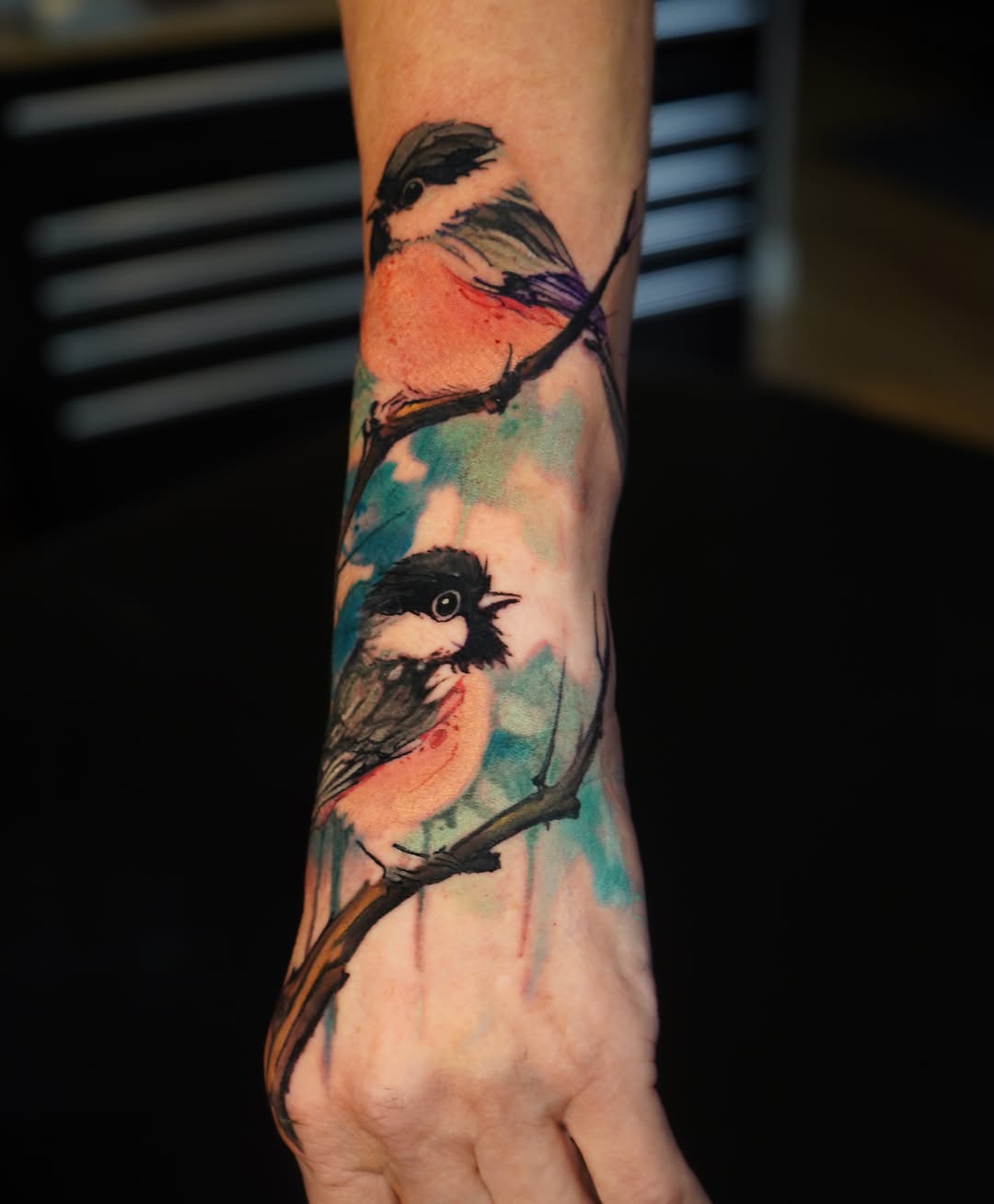 Birds watercolor tattoo on the forearm by Darl Gnau