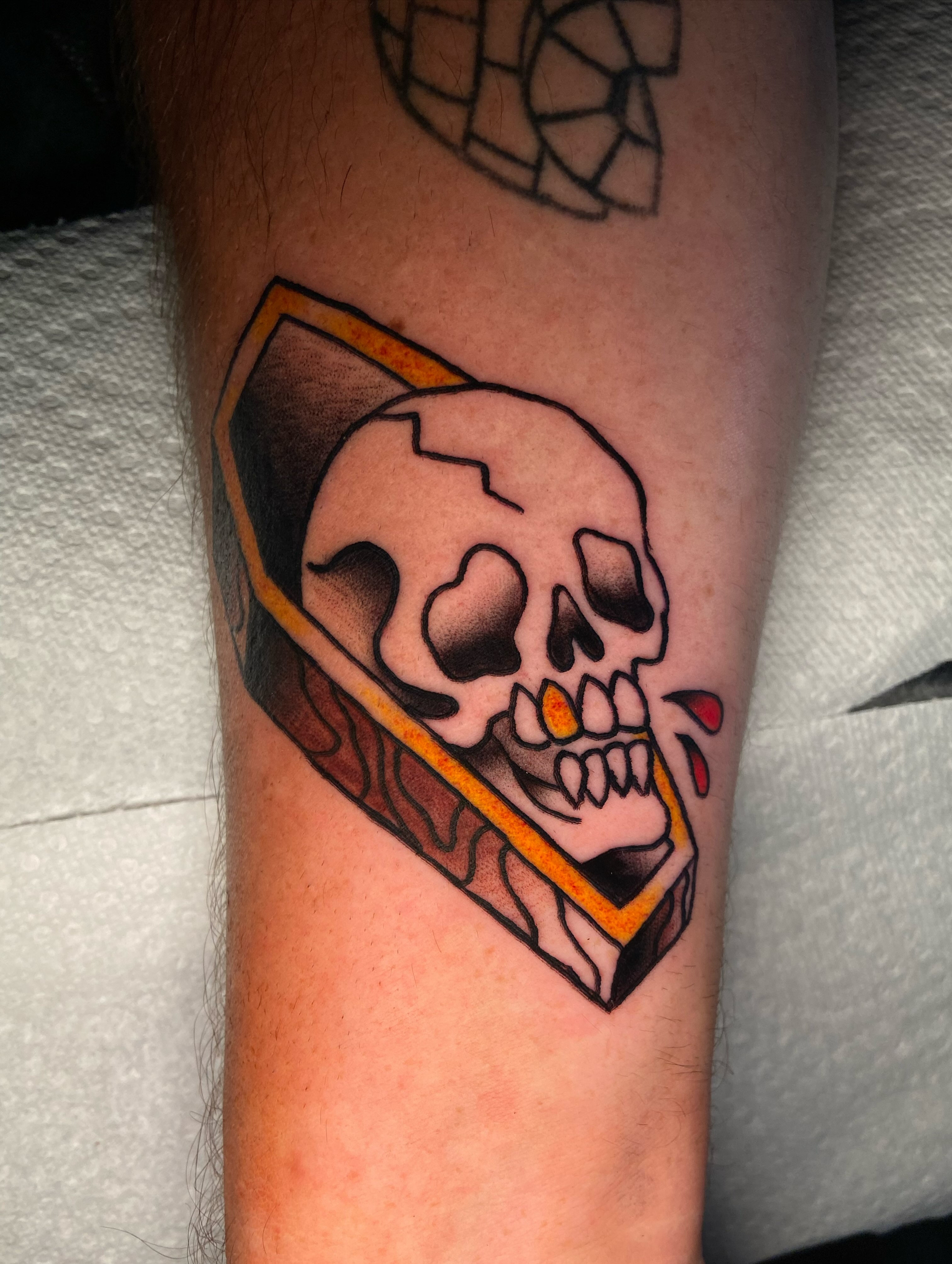 Skull in coffin American traditional tattoo on the forearm by 🐆Cam Feral Tattoos