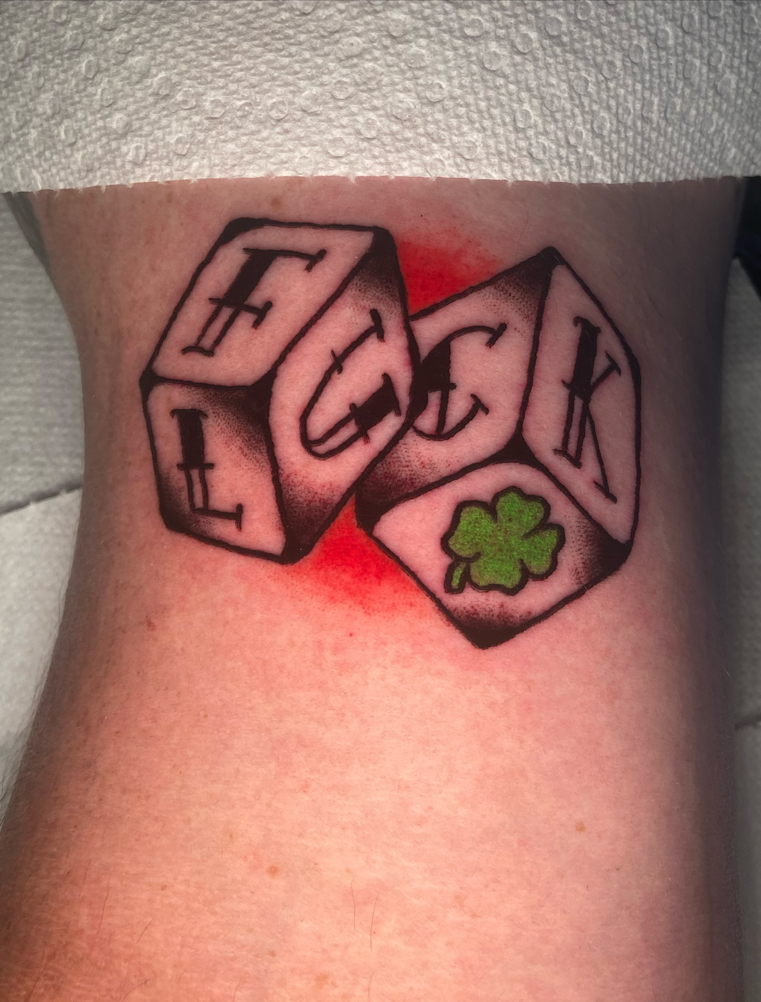 Dice with lettering American traditional tattoo on the thigh by 🐆Cam Feral Tattoos