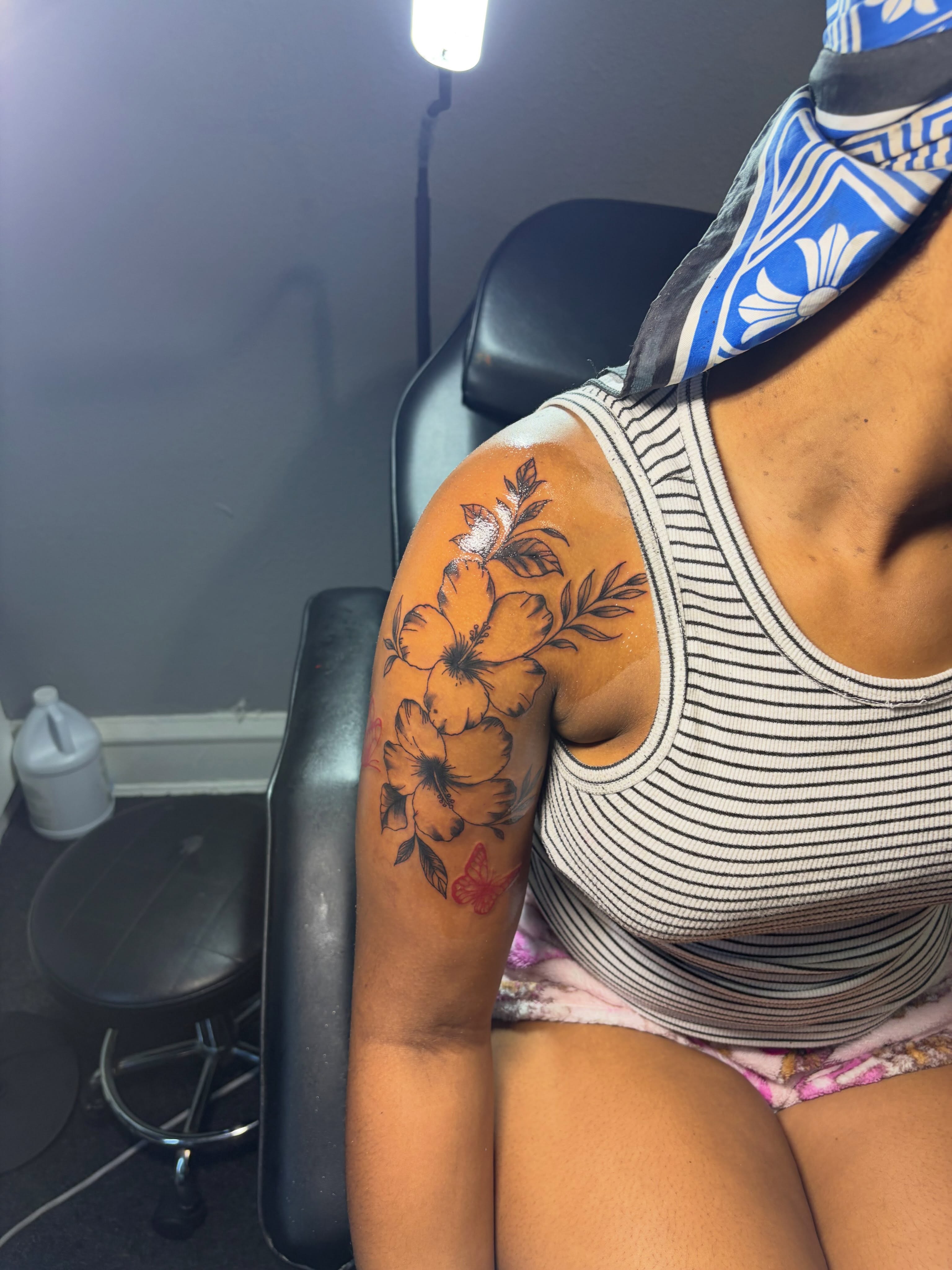 Hawaiian flowers new school tattoo on the shoulder by 216 Tattoos 🥰