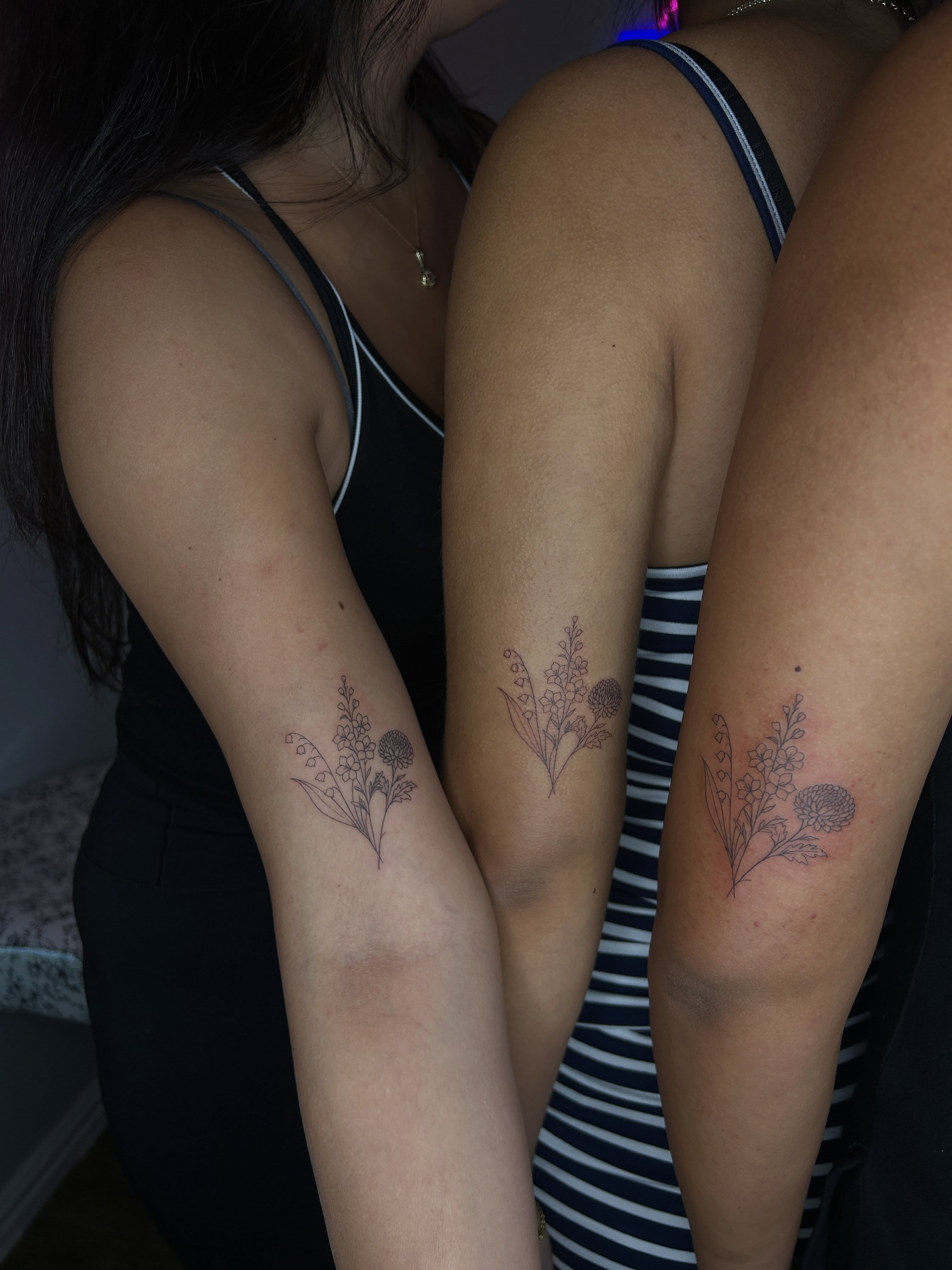 Floral arrangement black and grey tattoo on the forearm by @tattoosbyskyeee