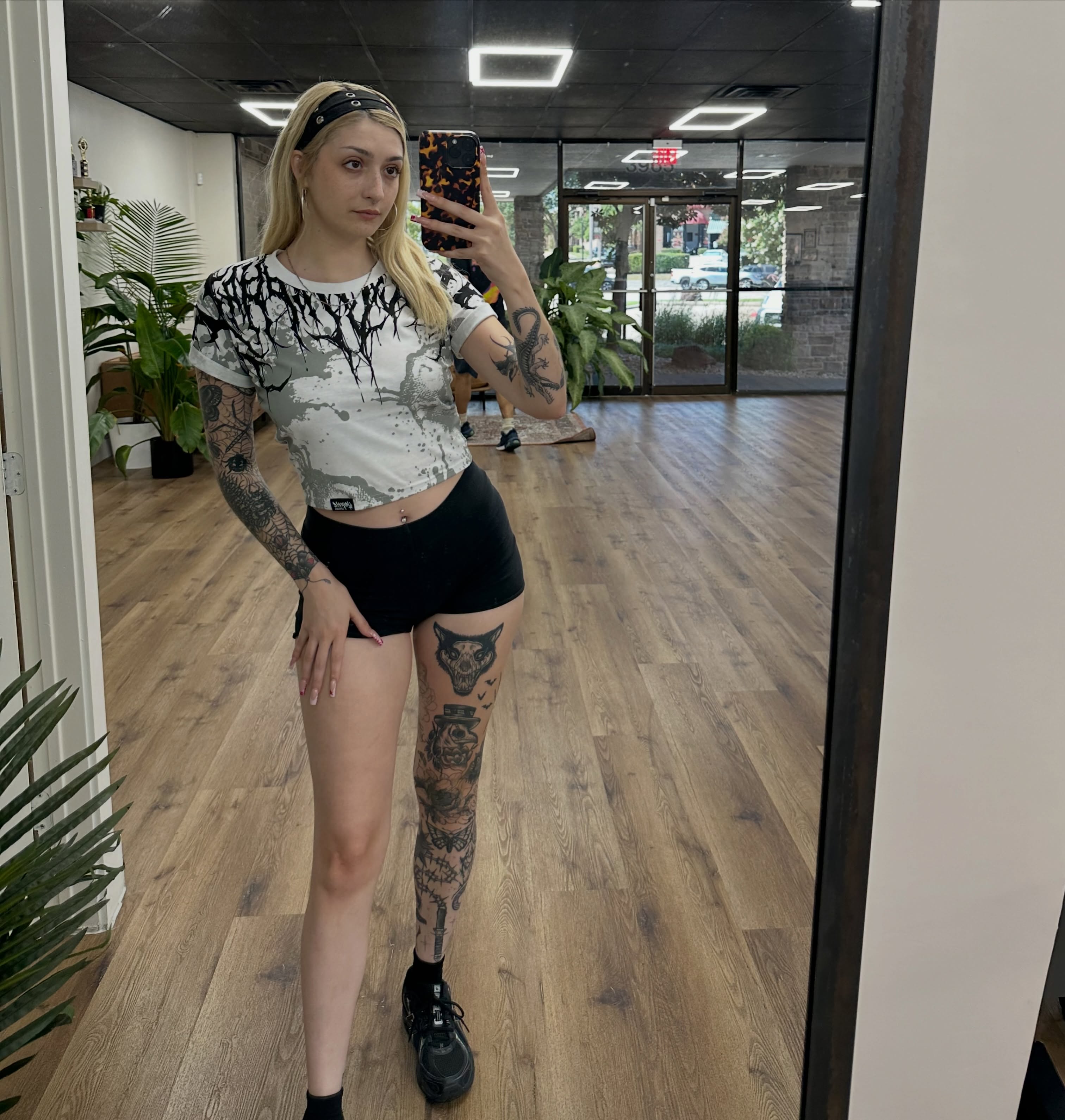 Tattooed leg black and grey tattoo on the leg by Brooklyn Bailey
