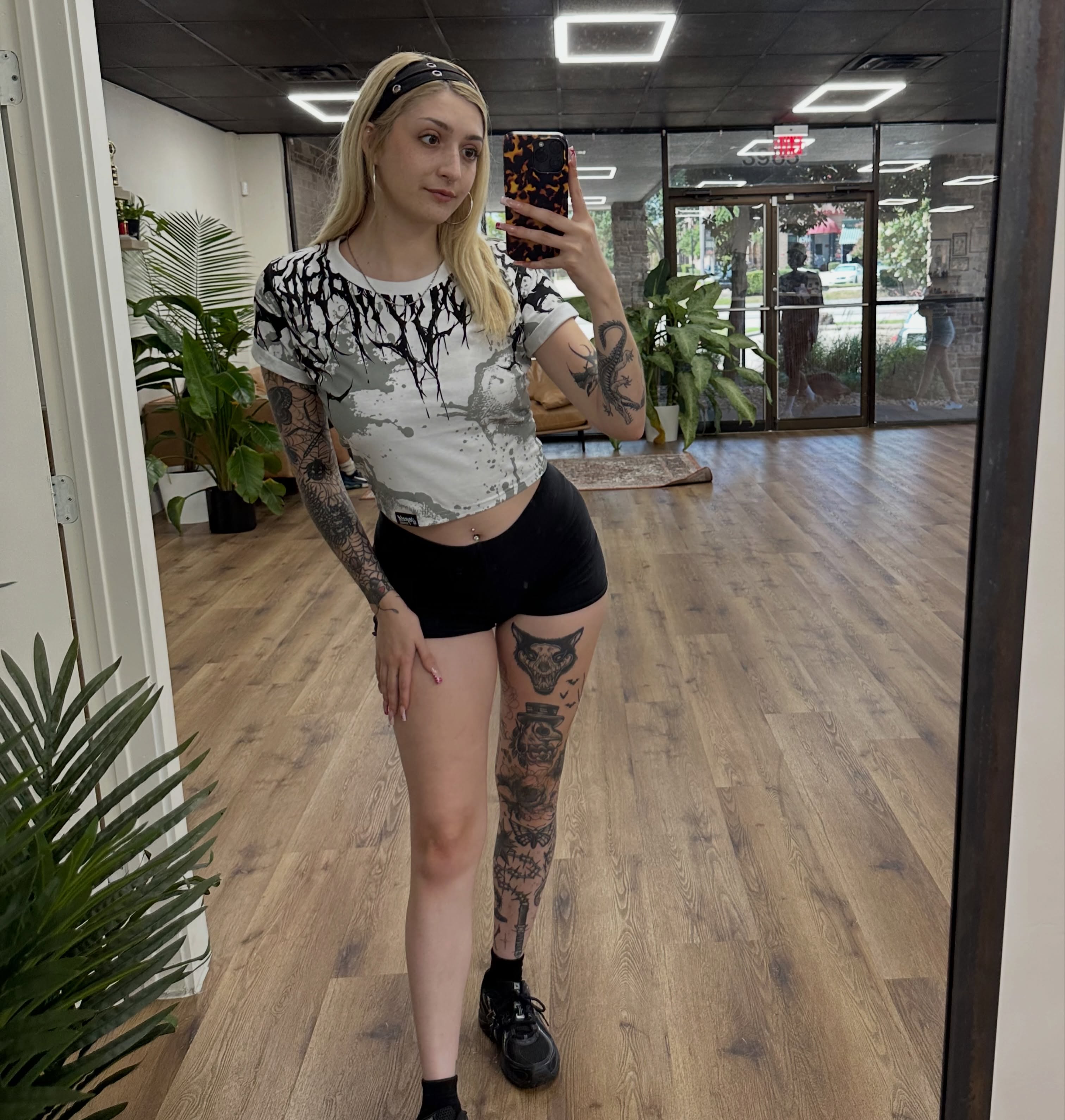 Tattooed leg black and grey tattoo on the leg by Brooklyn Bailey