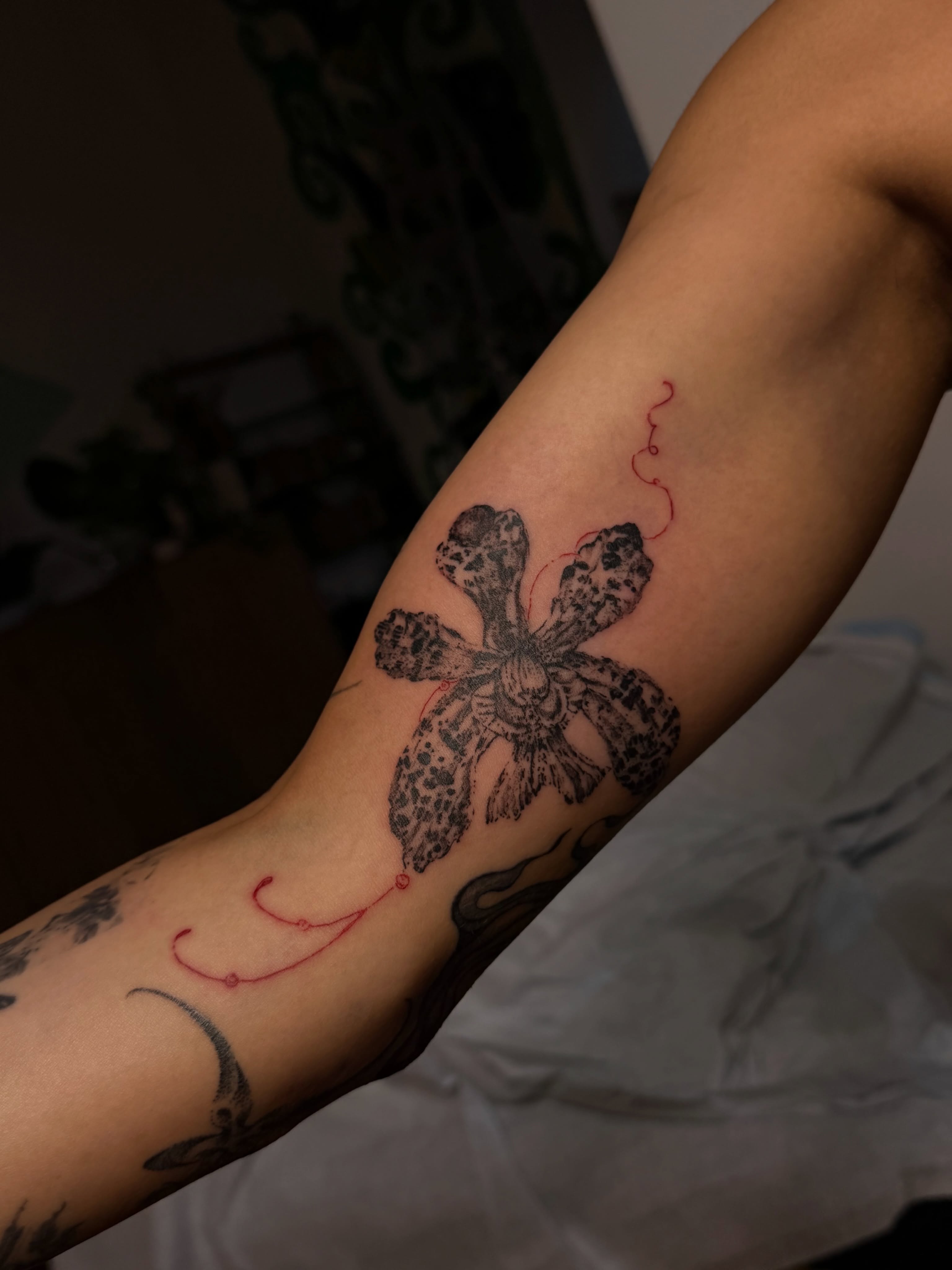 Flower black and grey tattoo on the forearm by Babymaxy Inks Llc
