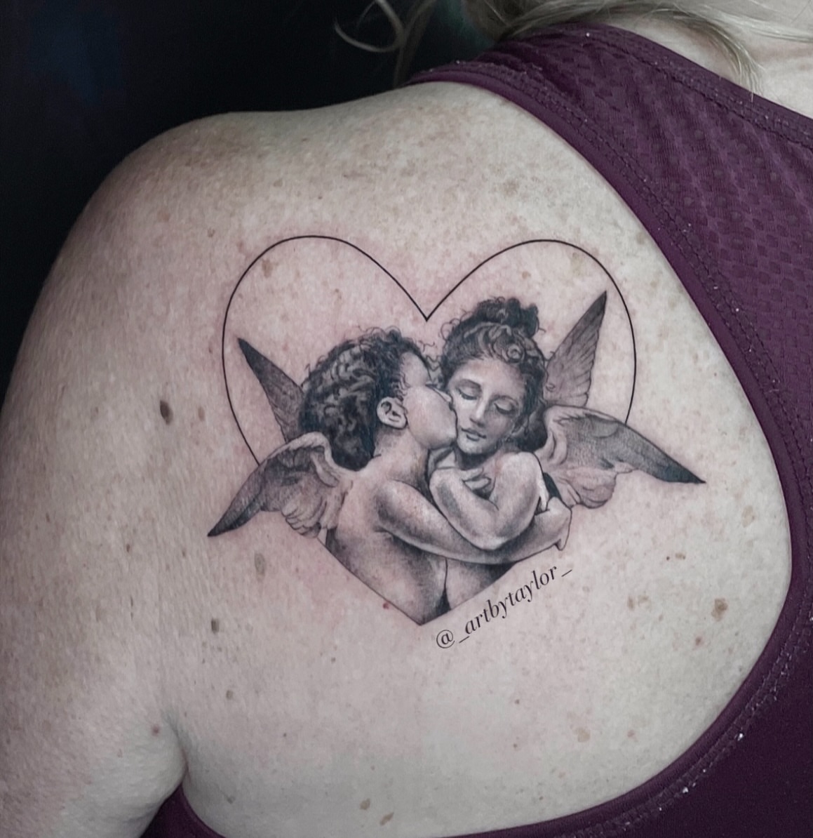 Angels kissing black and grey tattoo on the back by Taylor✍🏽️