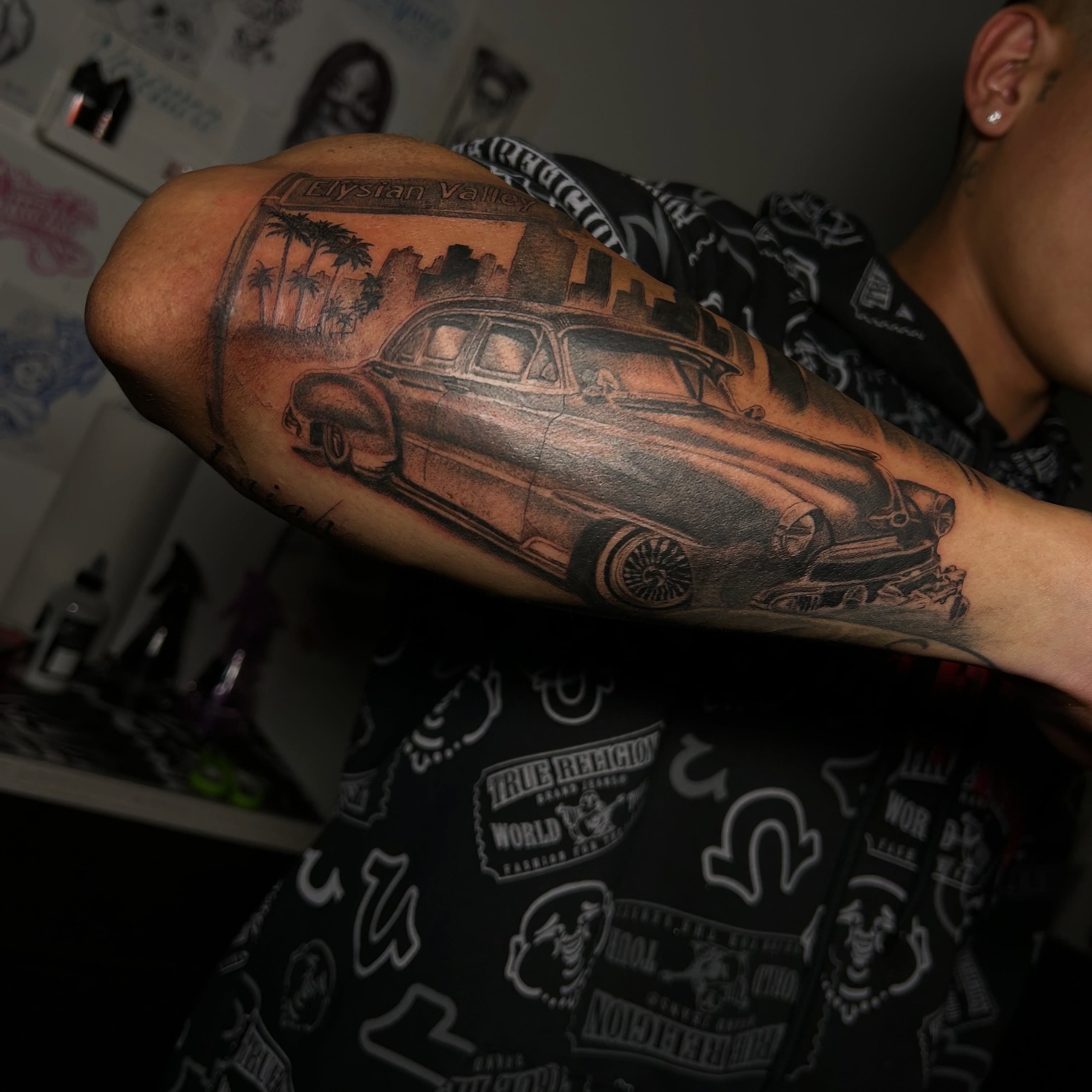 Classic car realism tattoo on the forearm by Ximena Favela