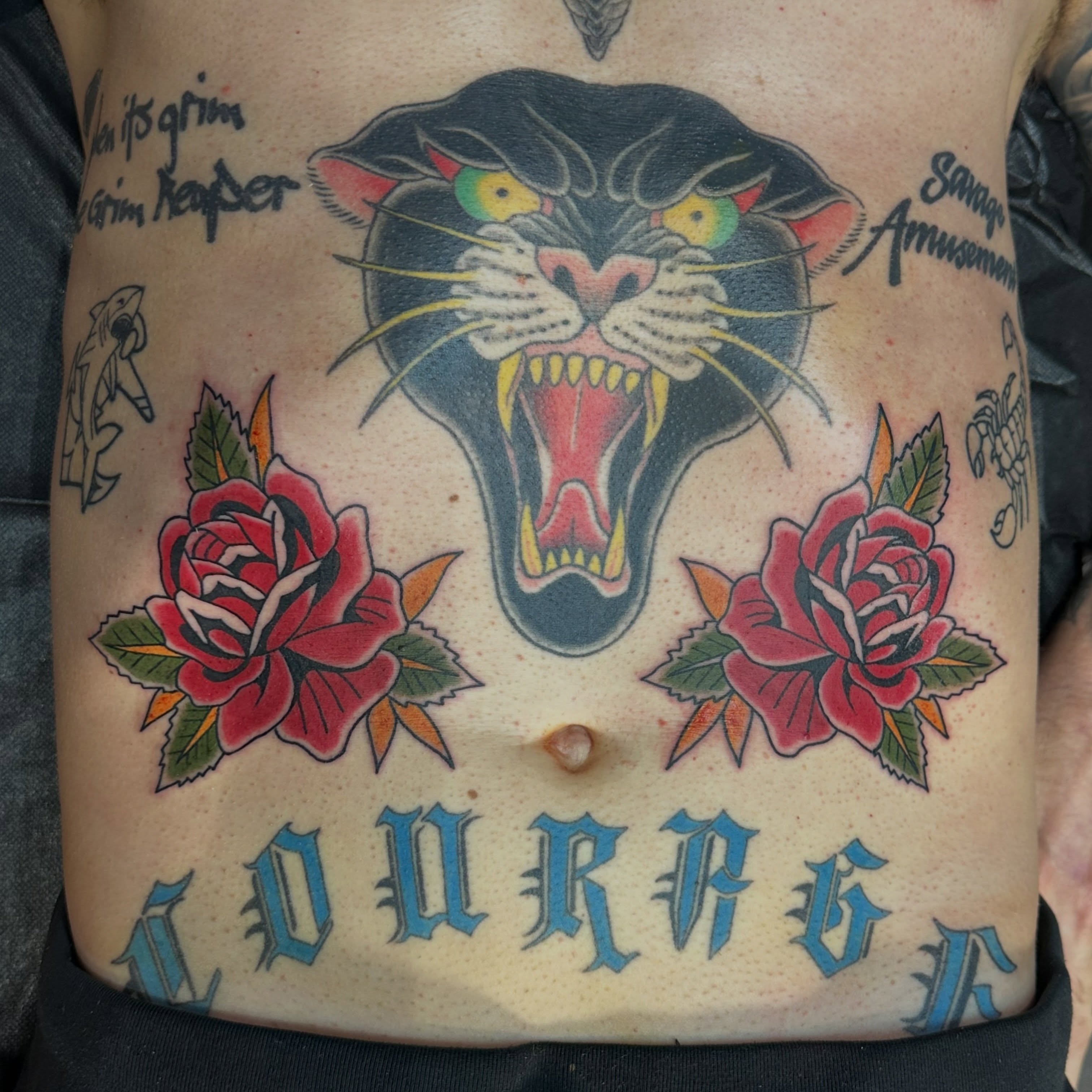 Panther and roses American traditional tattoo on the torso by Walk-in American Traditional Tattoos Las