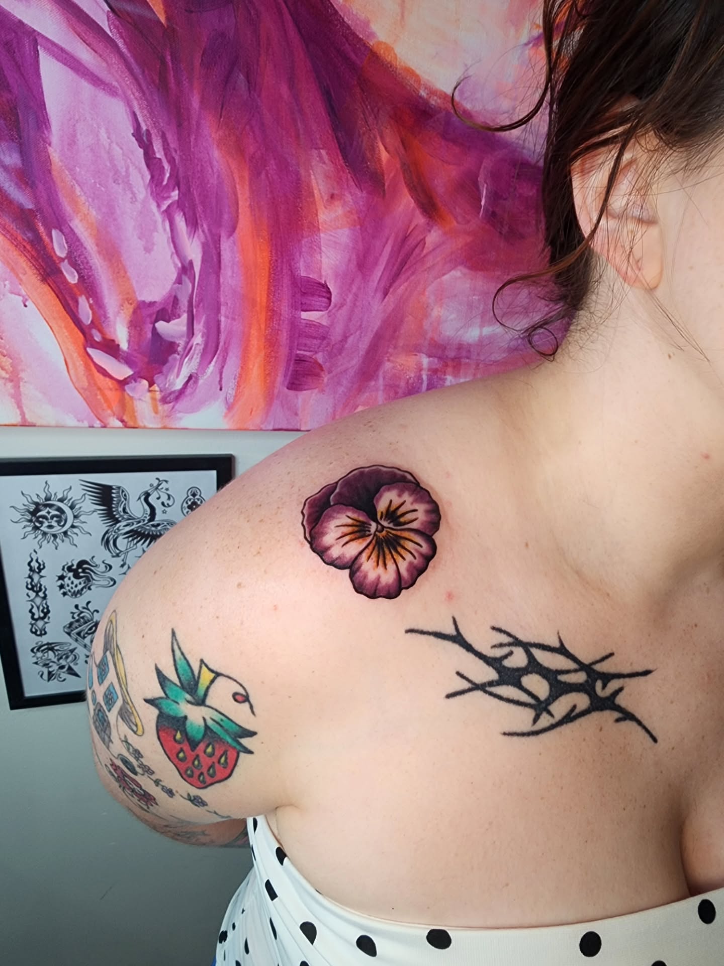 Flower realism tattoo on the shoulder by Maxine Stewart