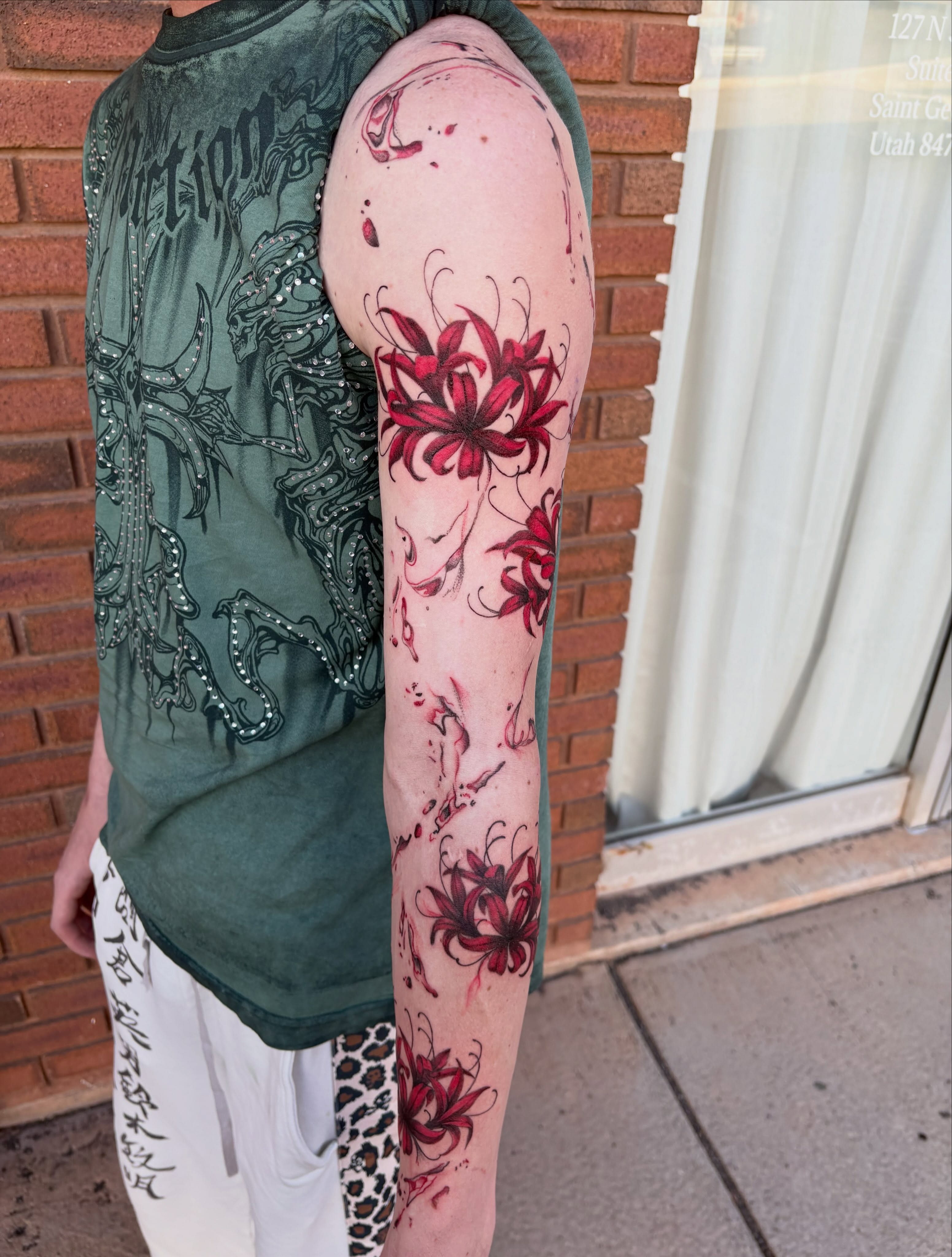 Chrysanthemums realism tattoo on the forearm by Sierra Maynard