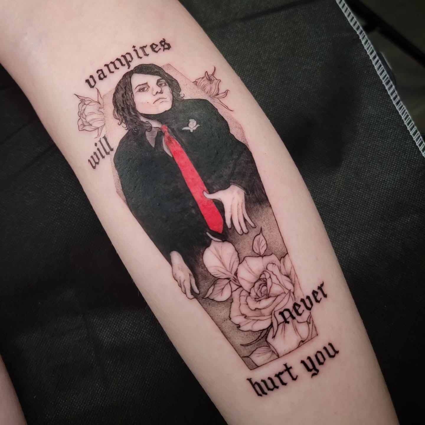 Vampire portrait realism tattoo on the forearm by Nathan Harkins-Oberbeck
