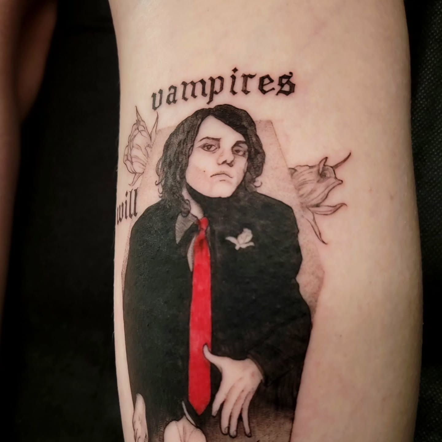 Vampires realism tattoo on the forearm by Nathan Harkins-Oberbeck