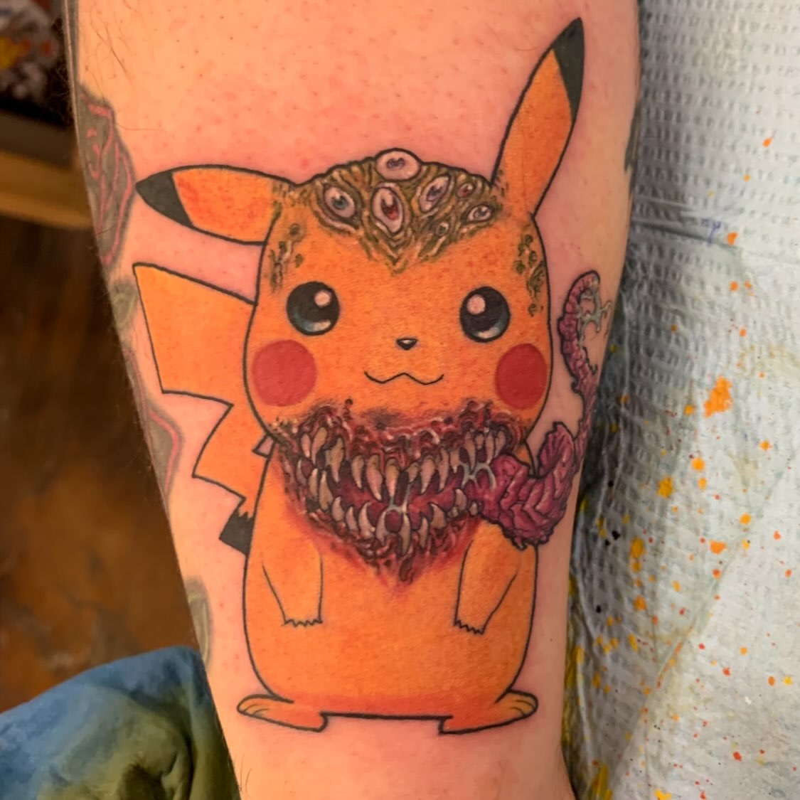 Pikachu dotwork tattoo on the forearm by Nathan Esteras