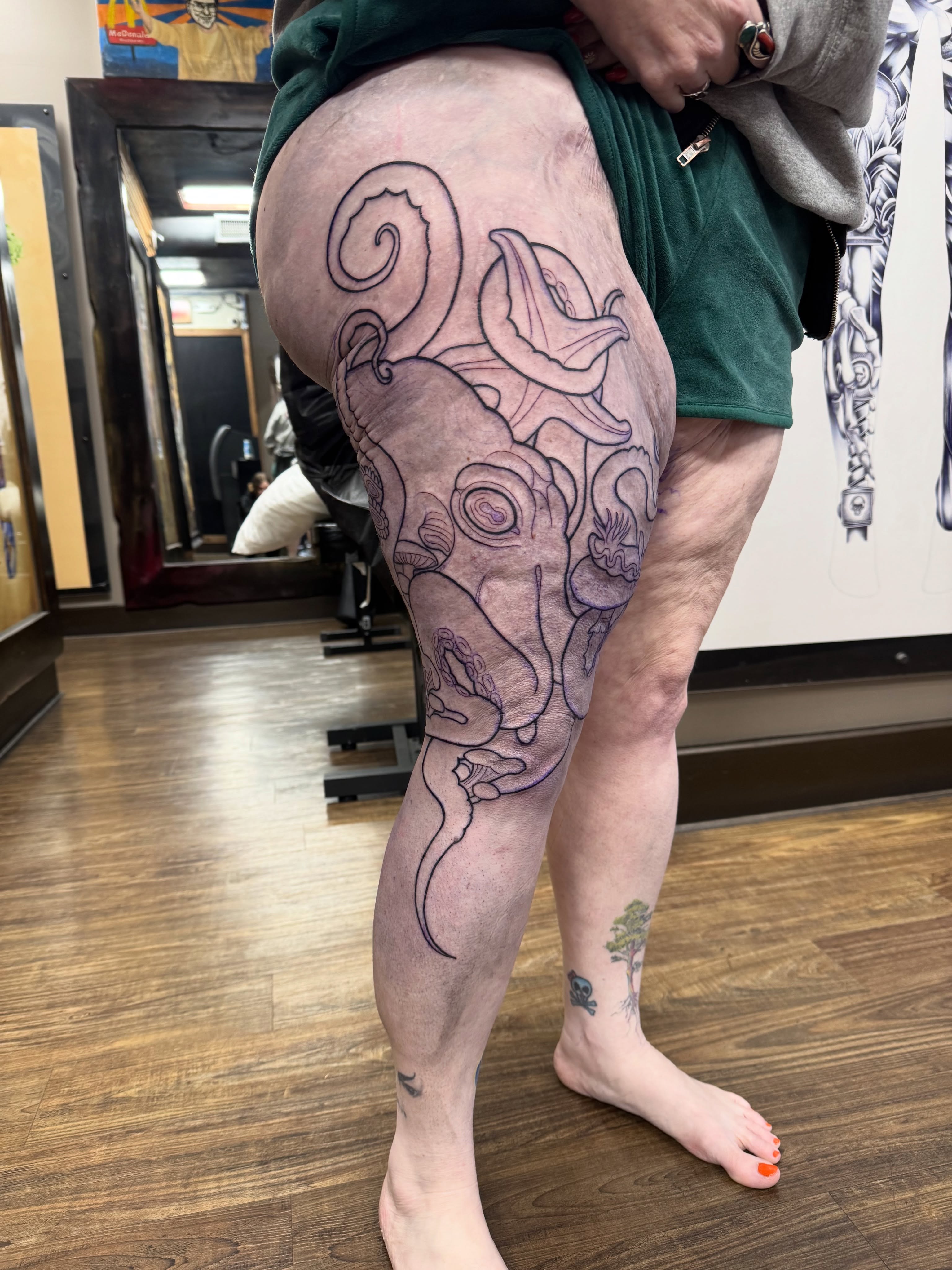 Octopus black and grey tattoo on the thigh by Andi Fitz ✨ San Diego Tattoo Artist, San Diego, California