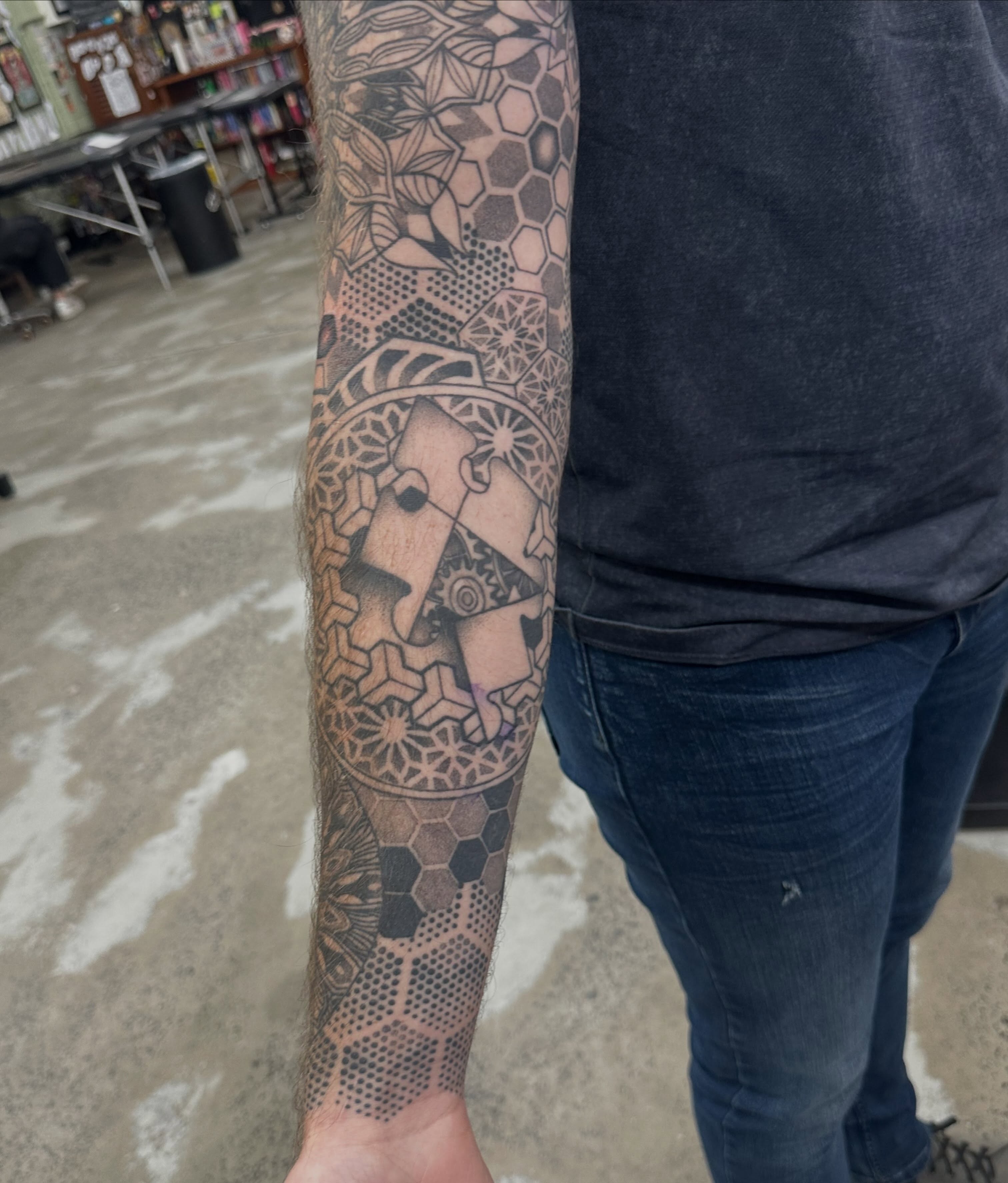 Geometric mandala dotwork tattoo on the forearm by Lyndsay Southgate