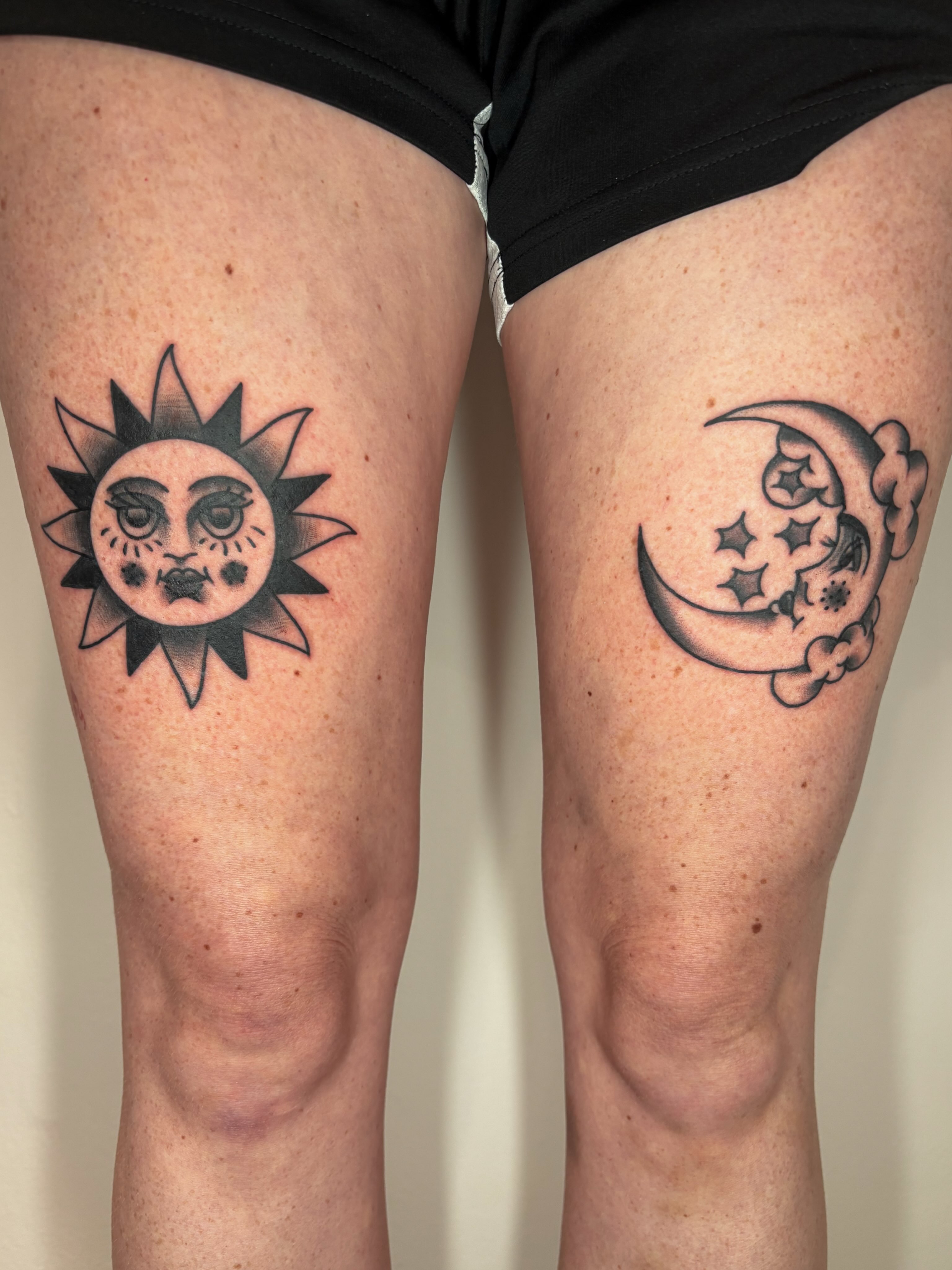 Sun and moon black and grey tattoo on the thigh by Evan Bisso, Philadelphia, Pennsylvania