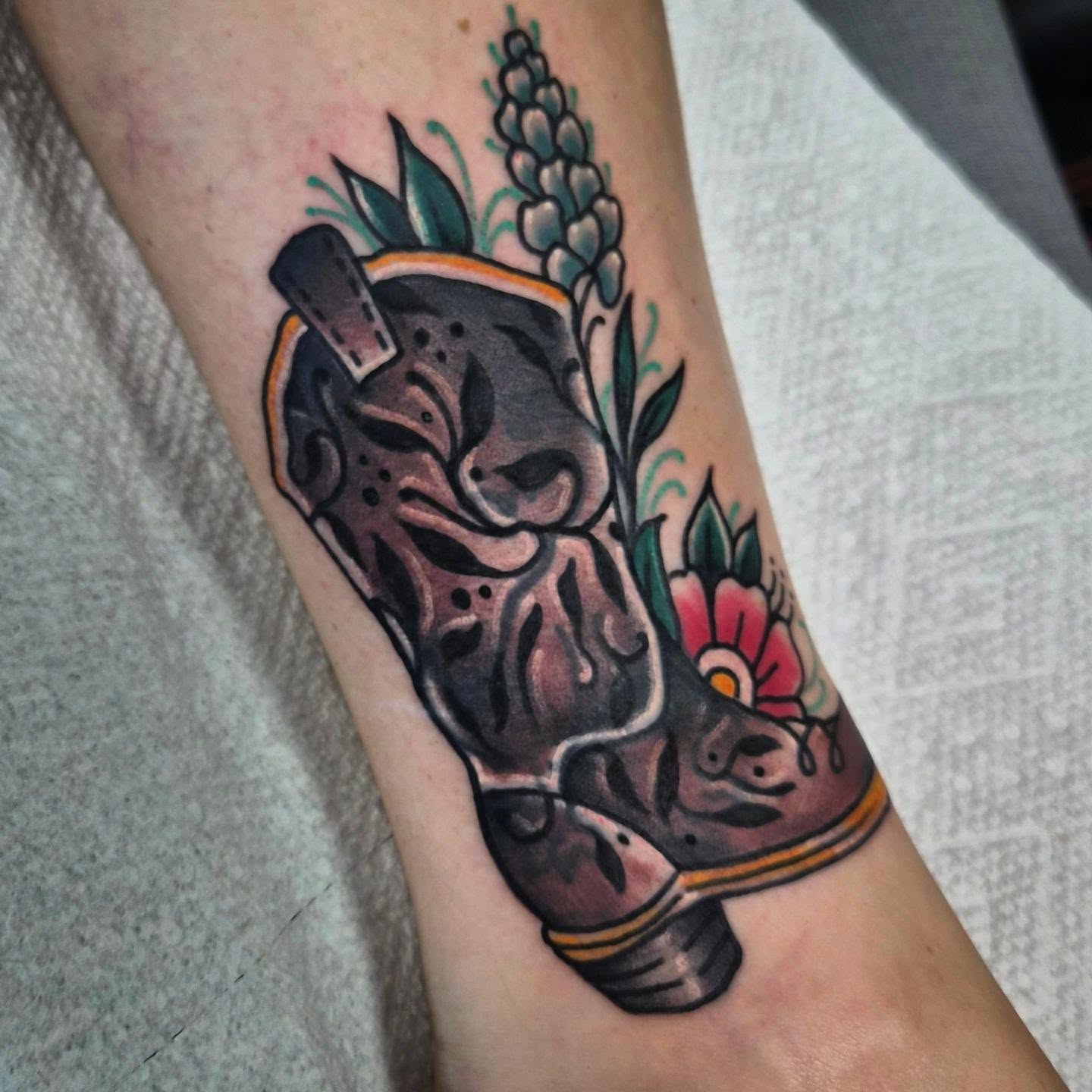 Cowboy boot American traditional tattoo on the forearm by Taylor Popkins