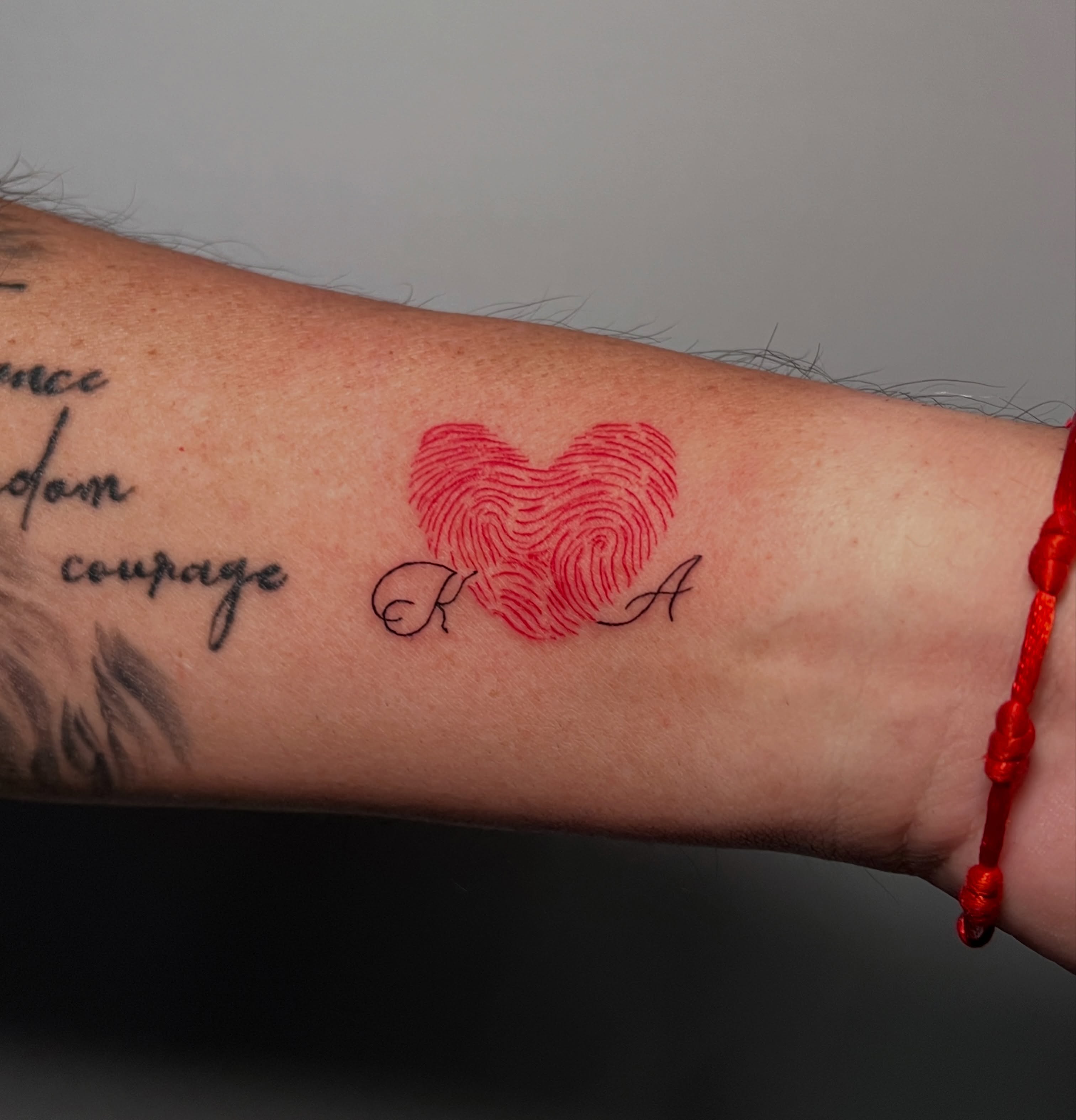 Heart fingerprint dotwork tattoo on the forearm by Eleana, North Miami, Florida