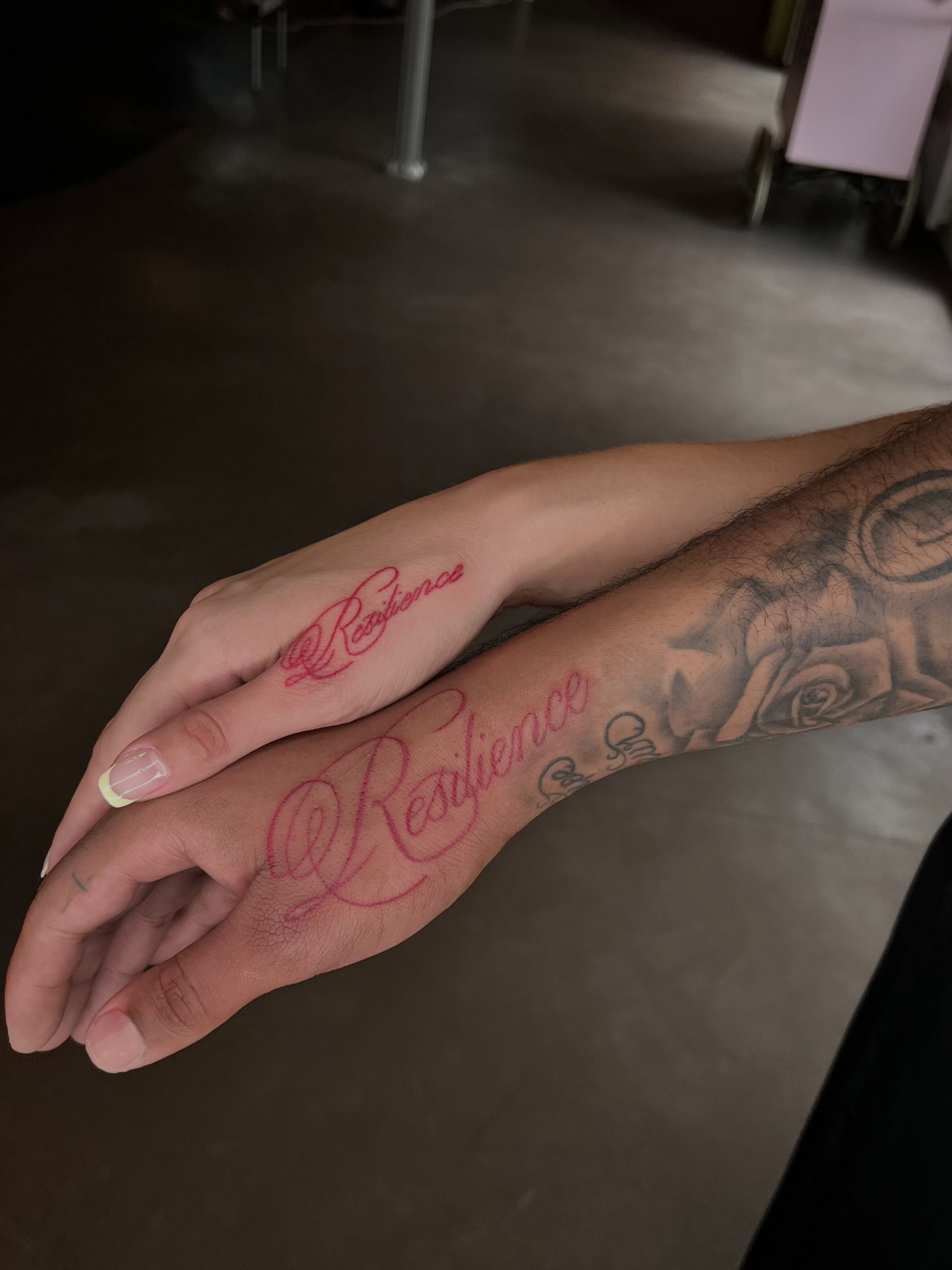 Resilience lettering script tattoo on the forearm by Tattoo (Réaliste), Toulouse, Occitanie