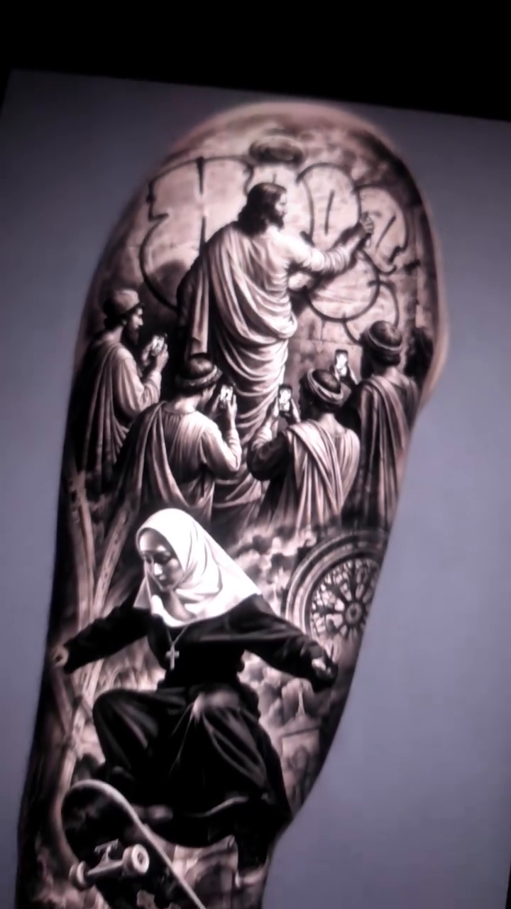 Jesus and a skateboarding nun realism tattoo on the upper arm by Xavier NYC TATTOO ARTIST