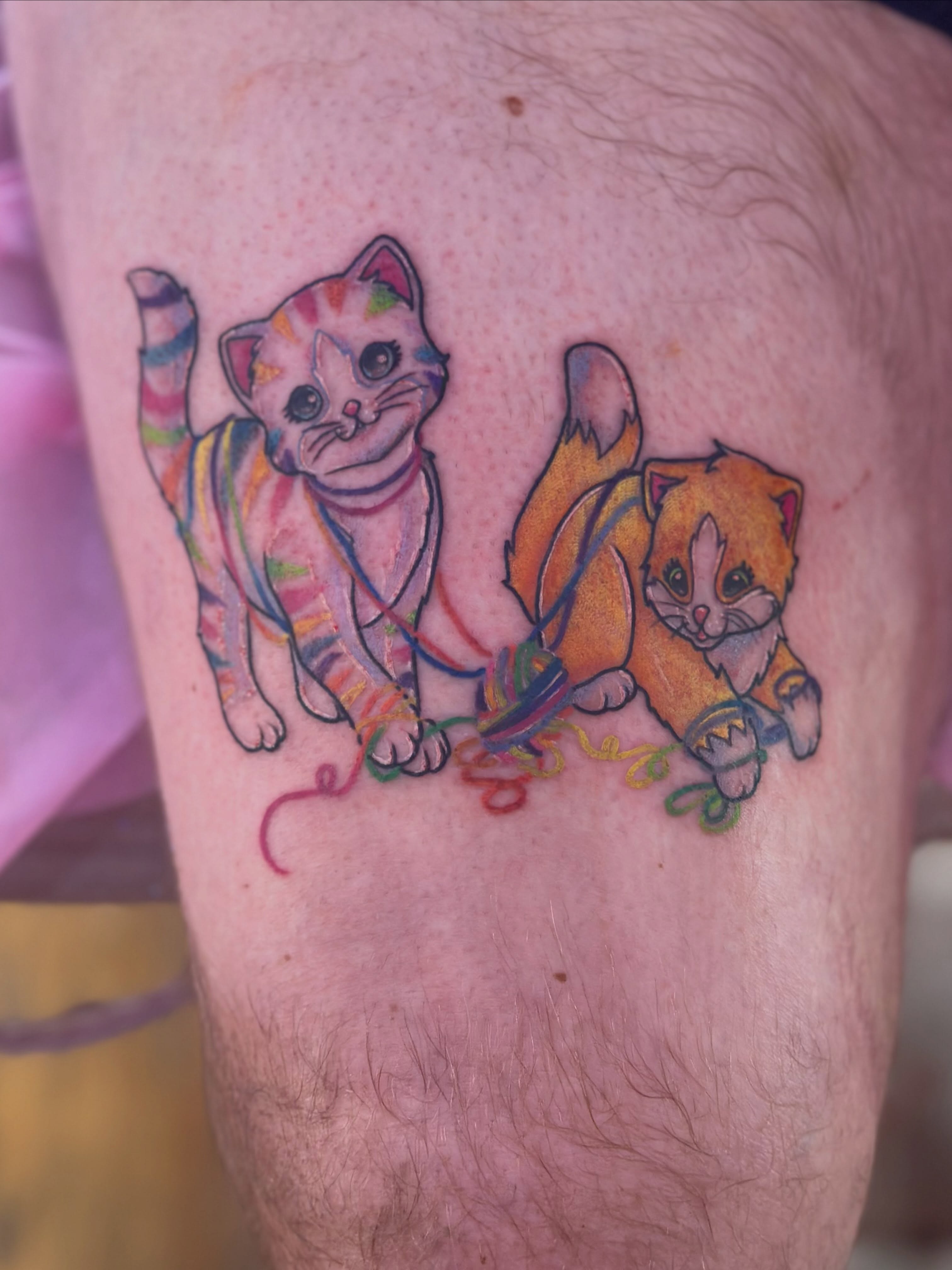 Two cats dotwork tattoo on the thigh by Erin Miller