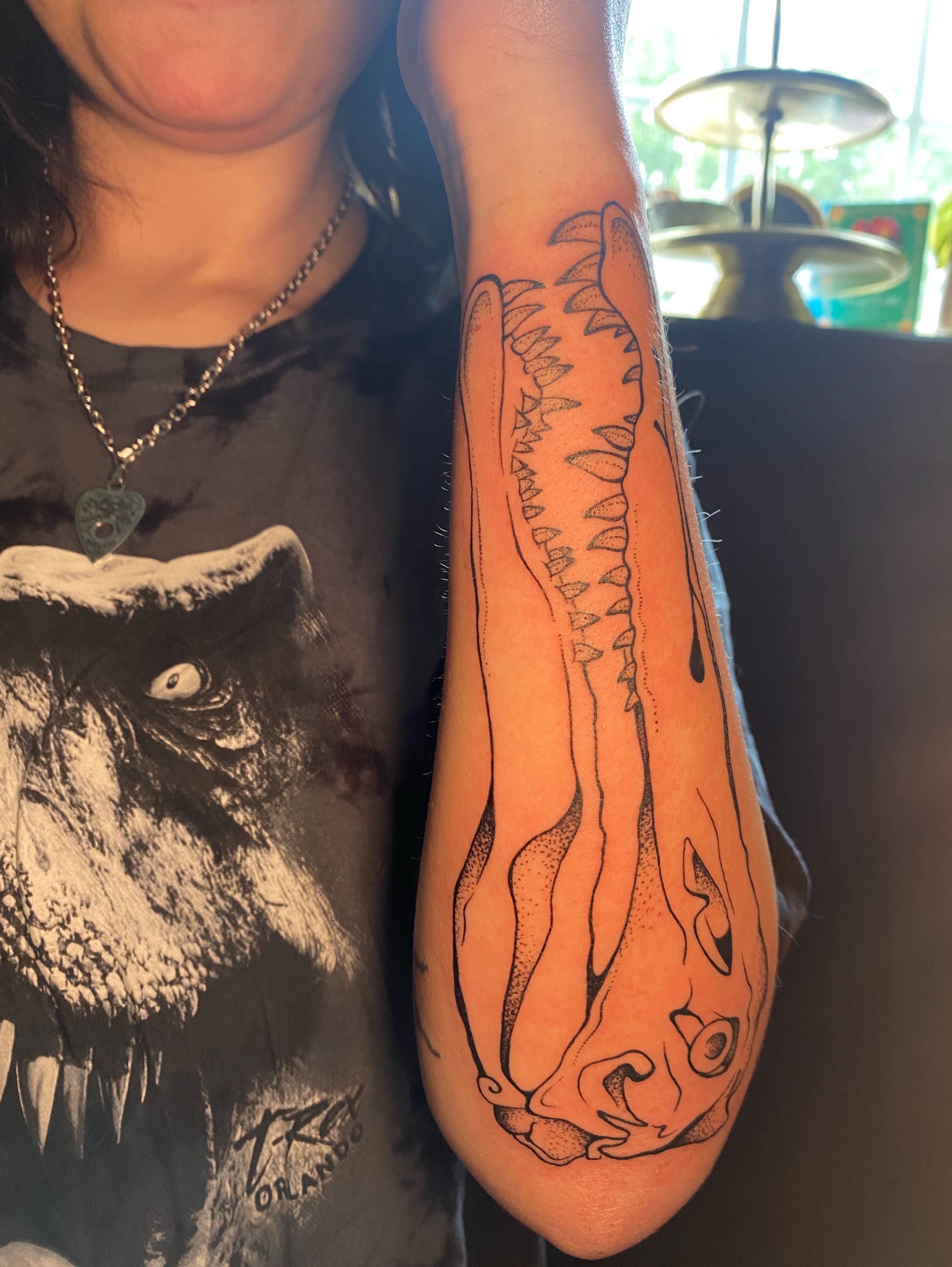 Tentacle dotwork tattoo on the forearm by Jesikah Rapp