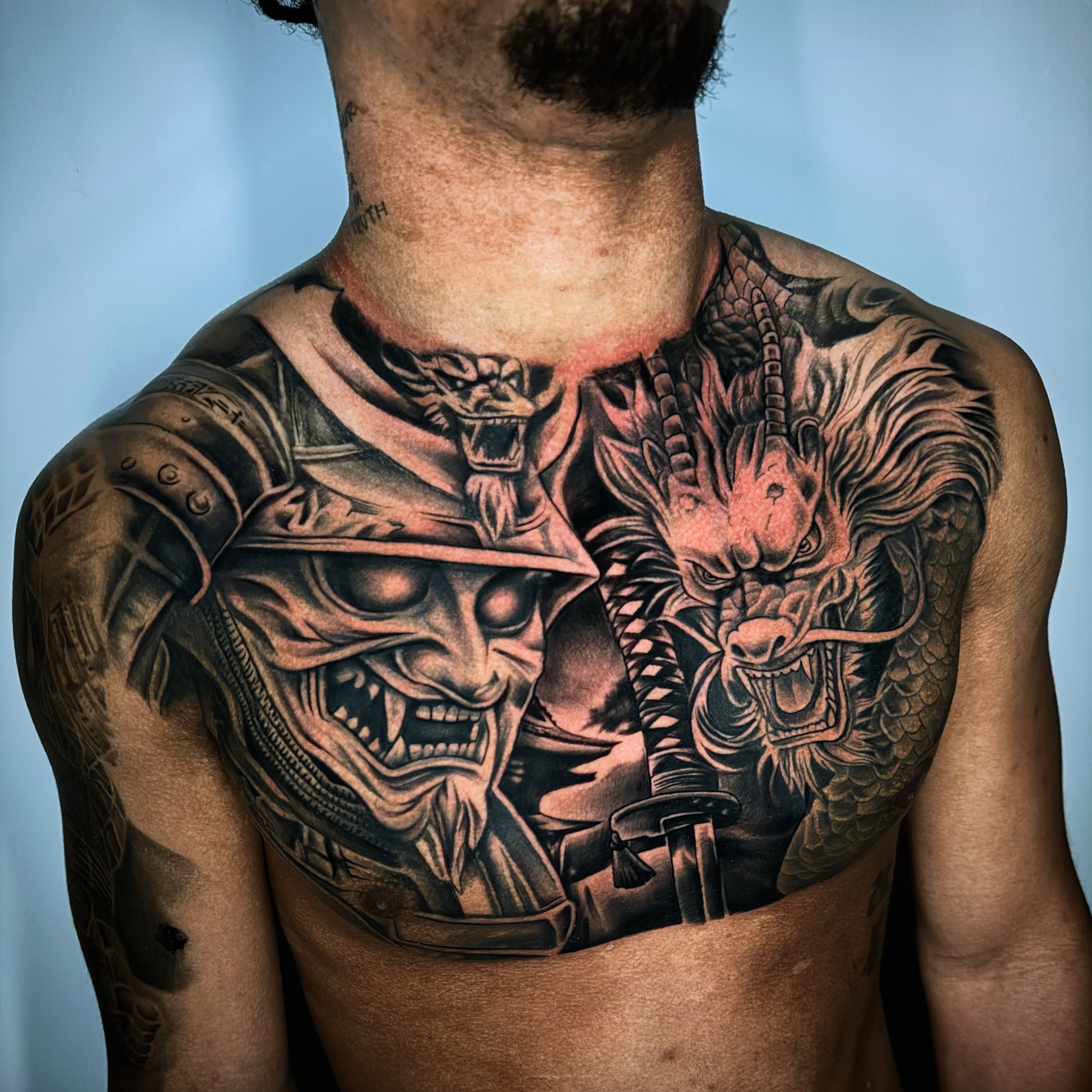 Samurai mask and dragon realism tattoo on the chest by Drink Ink Tattoos™ 👽