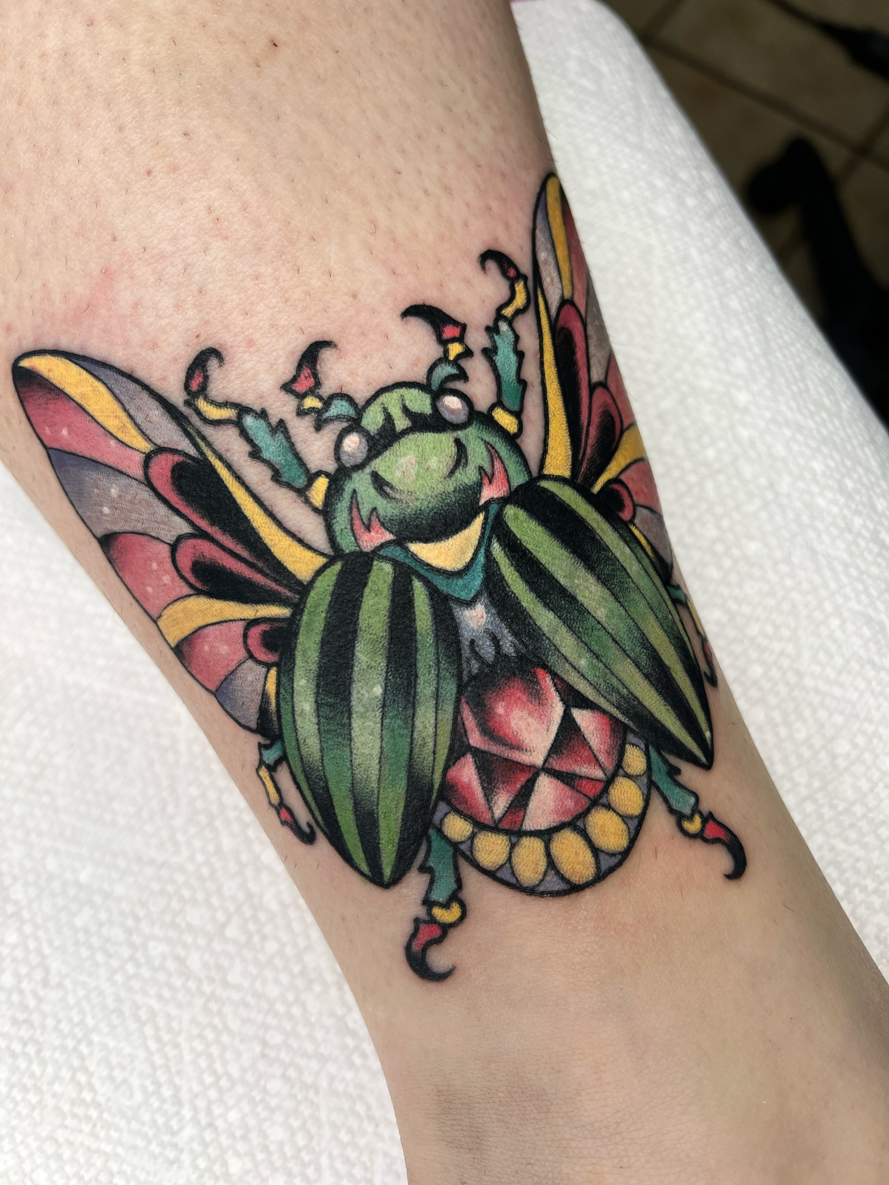Insect American traditional tattoo on the forearm by Leo 🌞 Pdx Tattoo