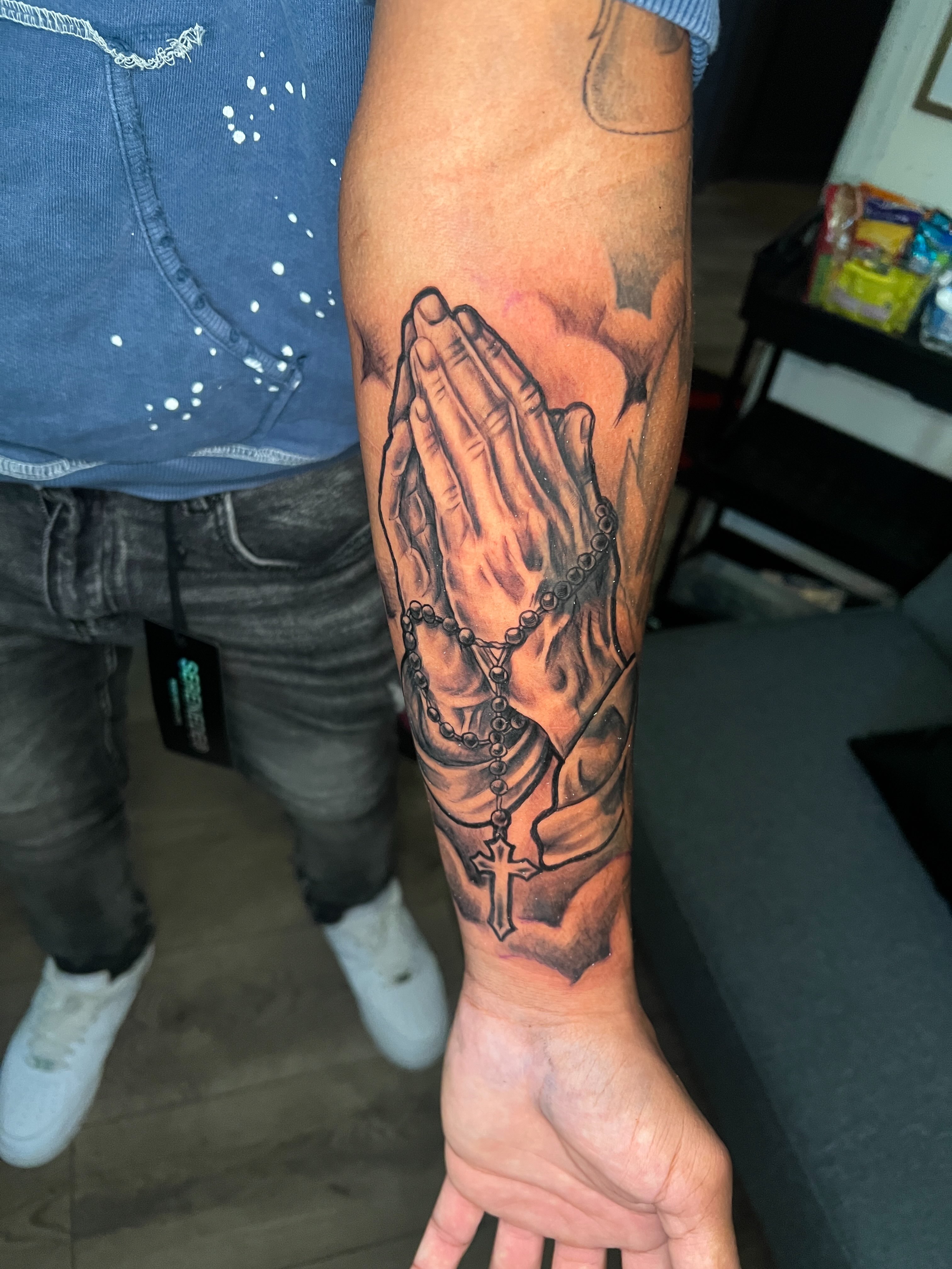 Praying hands realism tattoo on the forearm by Justx4rt