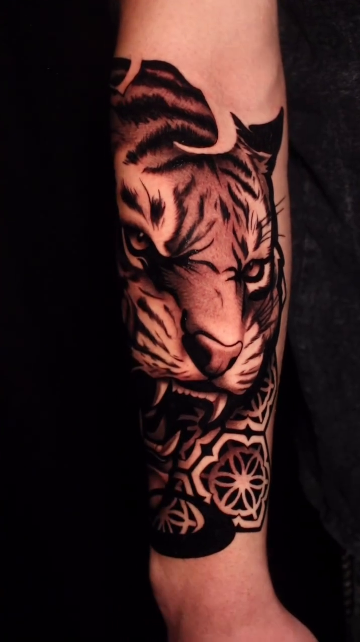 Tattoo by @taboo.tattoos_ — realism, black_and_grey
