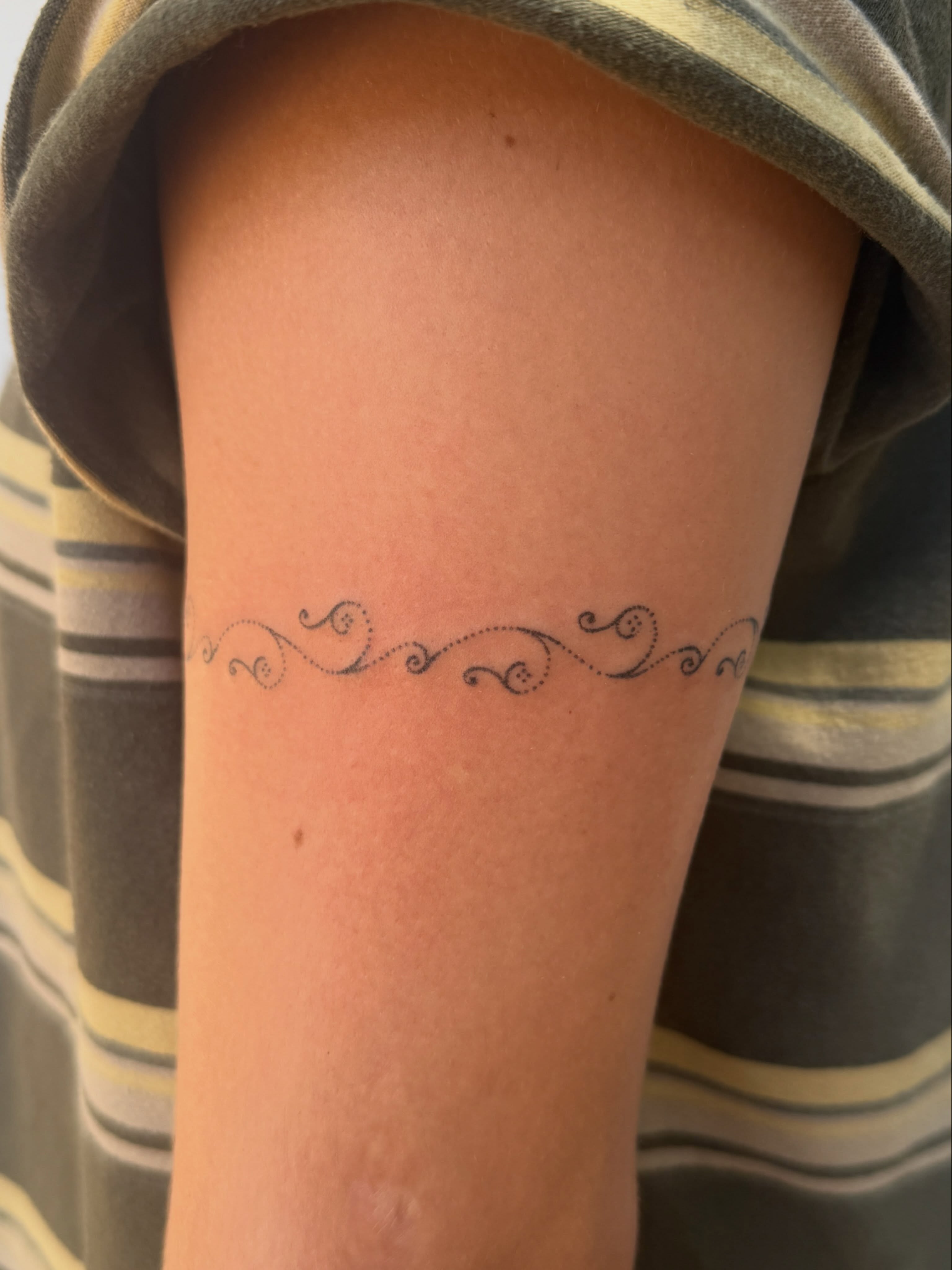 Swirls fine line tattoo on the forearm by springgreens