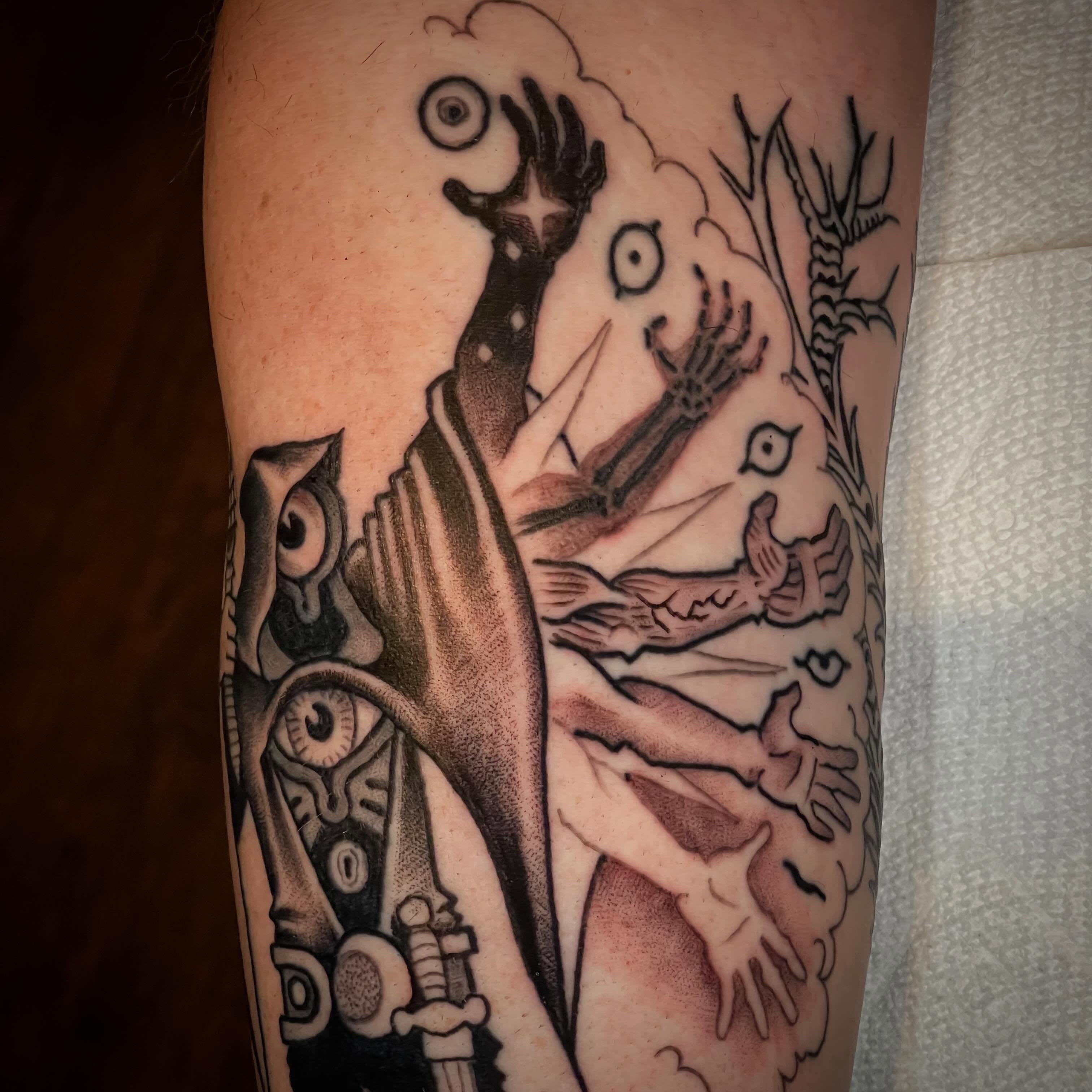 Abstract surrealism surrealism tattoo on the forearm by Ian Bederman, Austin, Texas