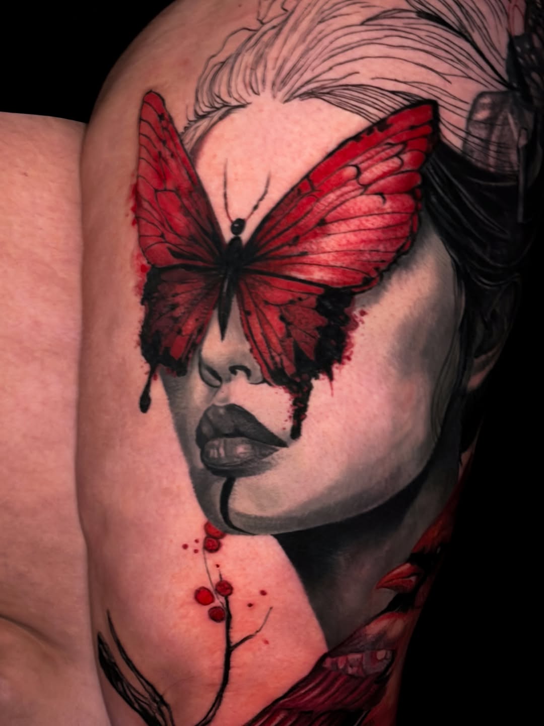 Woman with butterfly sketch tattoo on the shoulder by ✨ Tattoo Artist