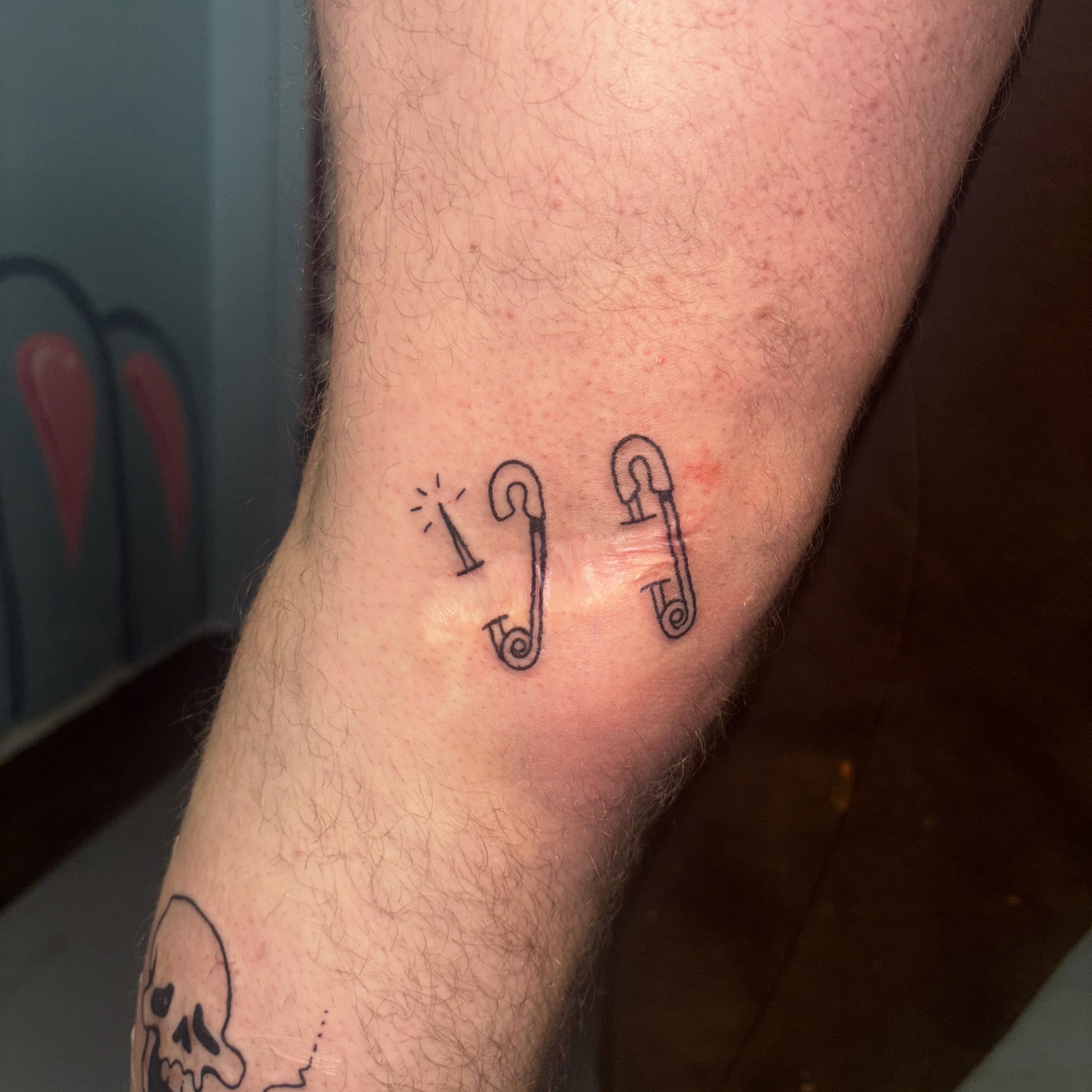 Safety pins fine line tattoo on the forearm by ☠️mikauley☠️