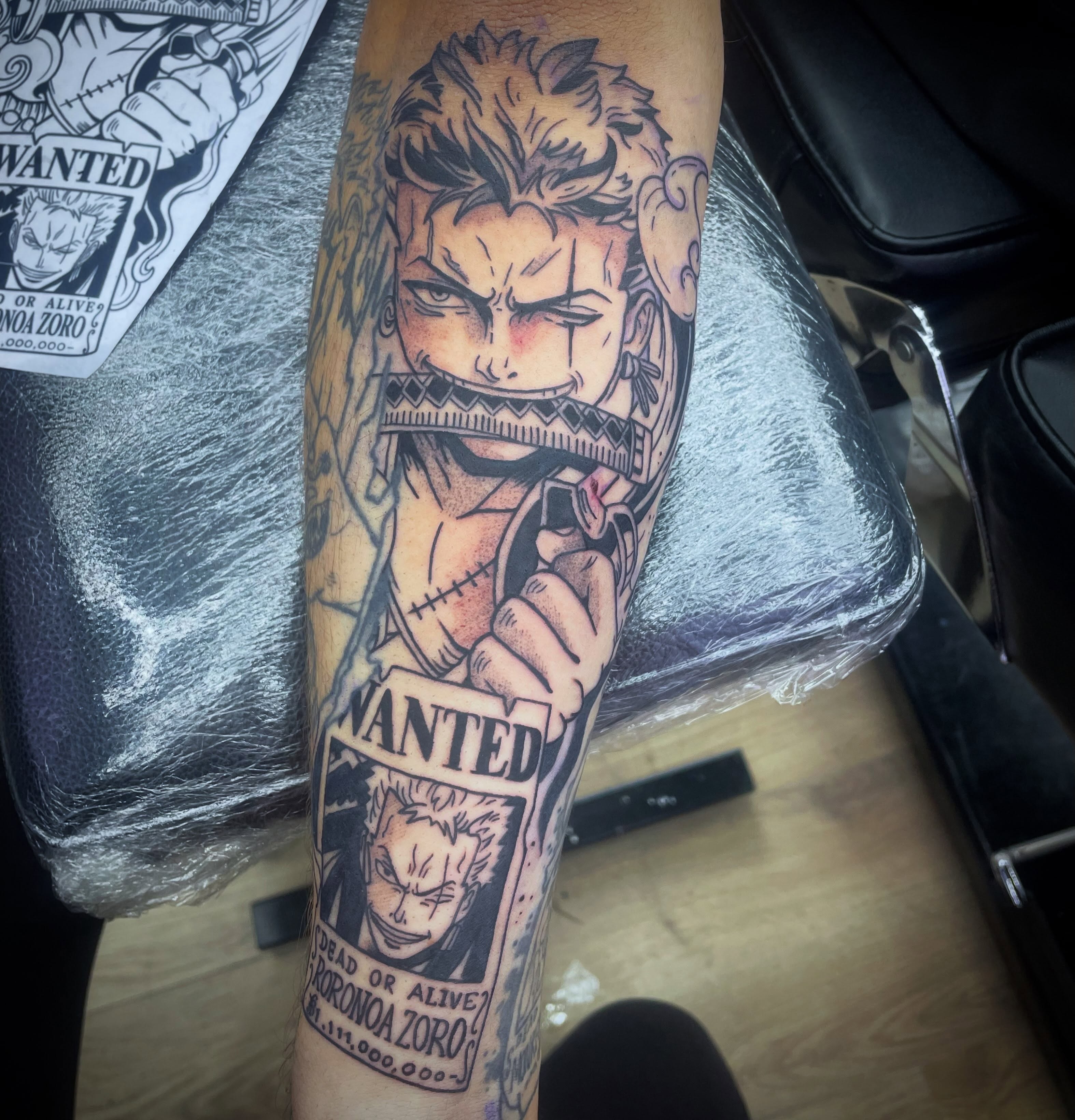 Anime character anime tattoo on the forearm by elly, Oakham