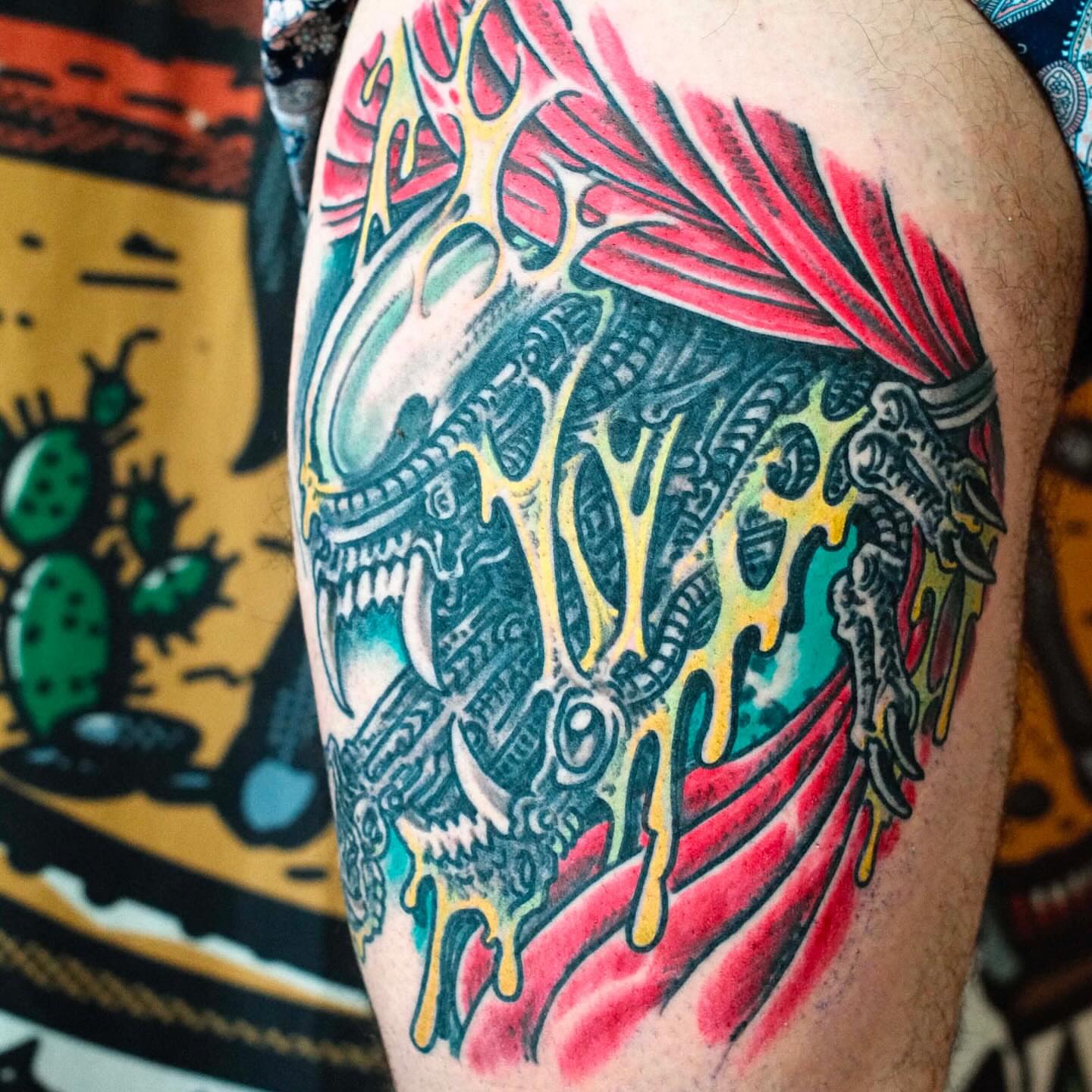Alien creature American traditional tattoo on the thigh by Mike Wilson
