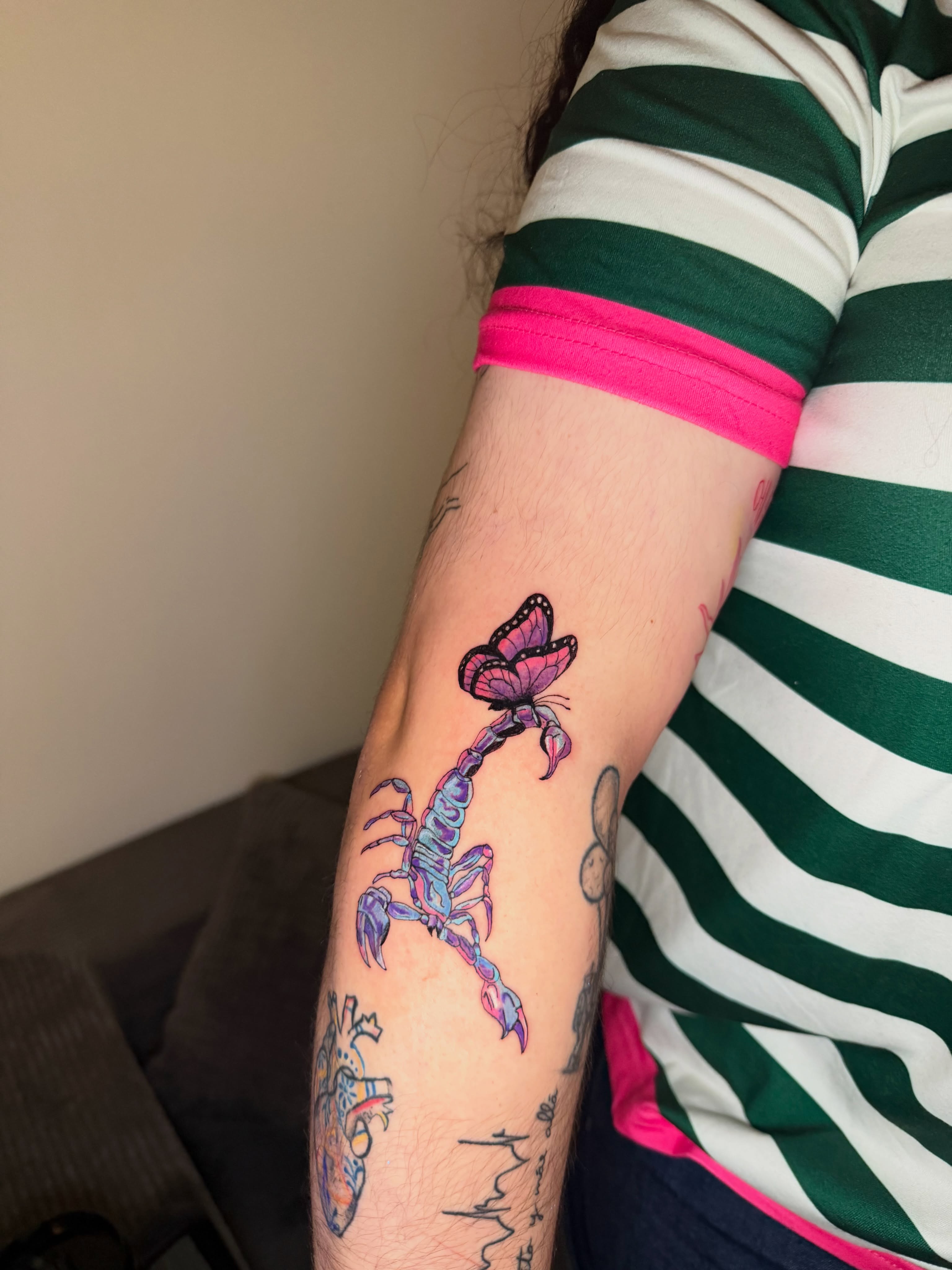 Scorpion and butterfly new school tattoo on the forearm by Sebastian martinez, Memphis, Tennessee