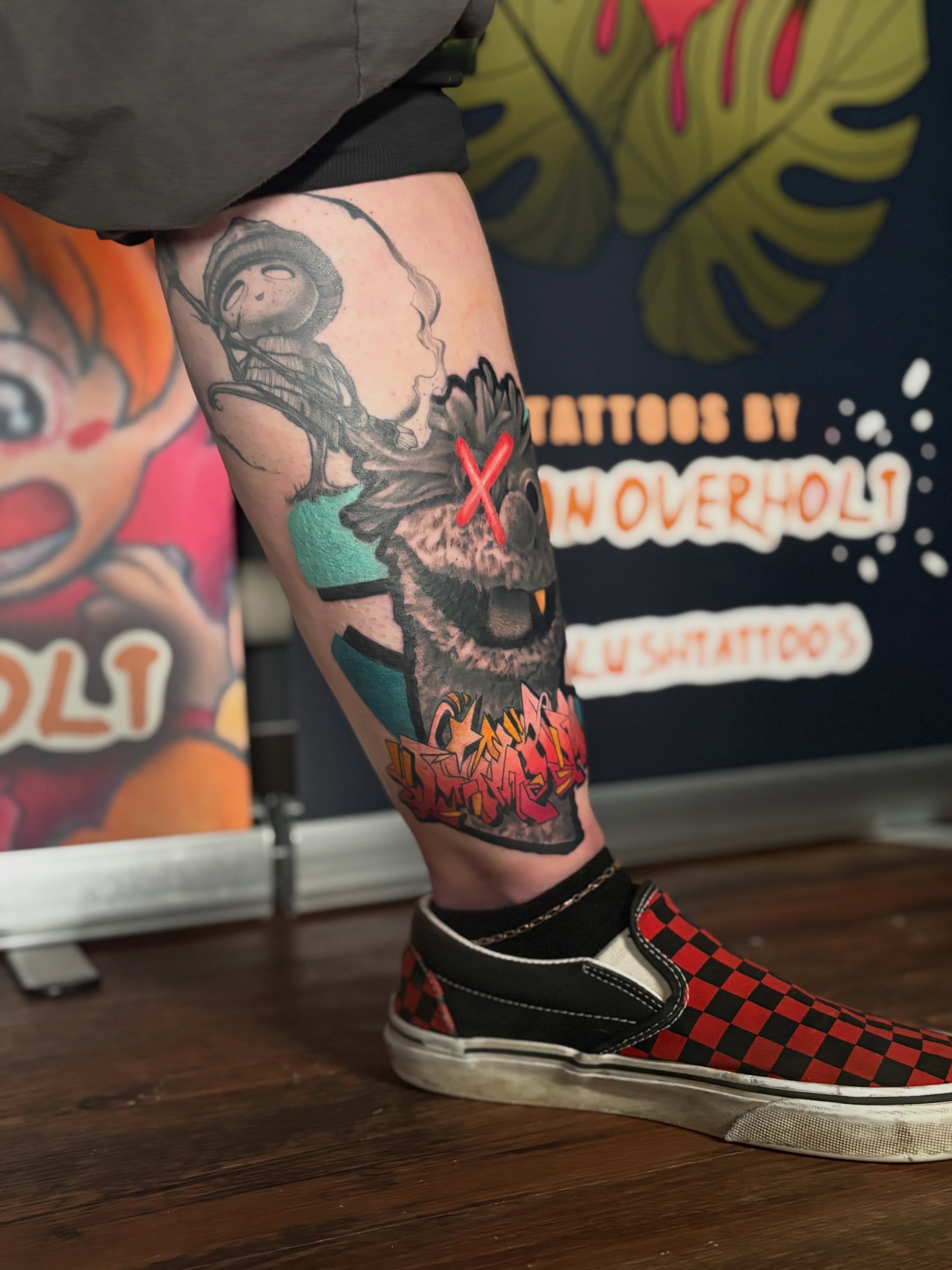 Owl with flame neo-traditional tattoo on the calf by Brian Overholt