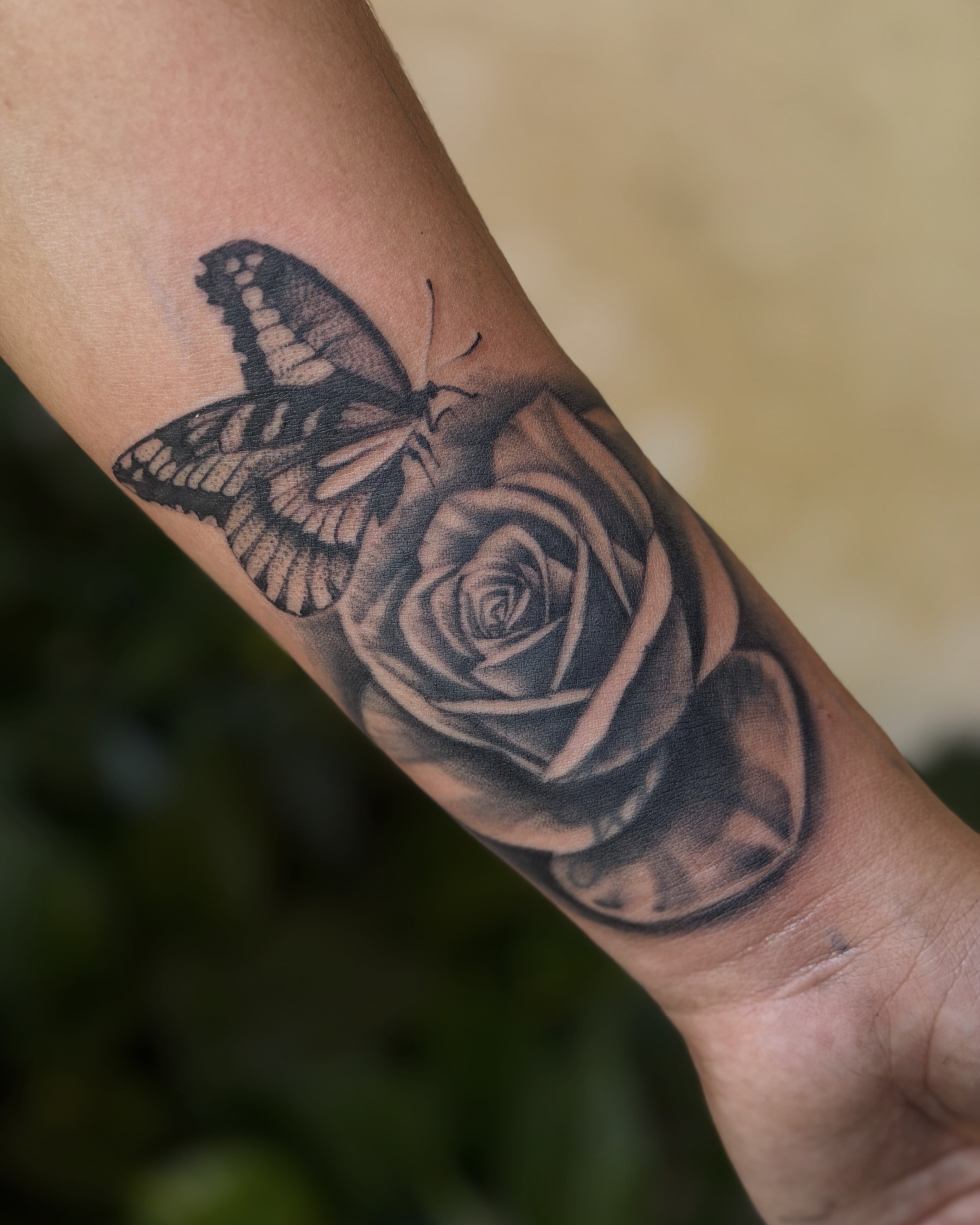 Rose and butterfly realism tattoo on the forearm by 💞Juju💕