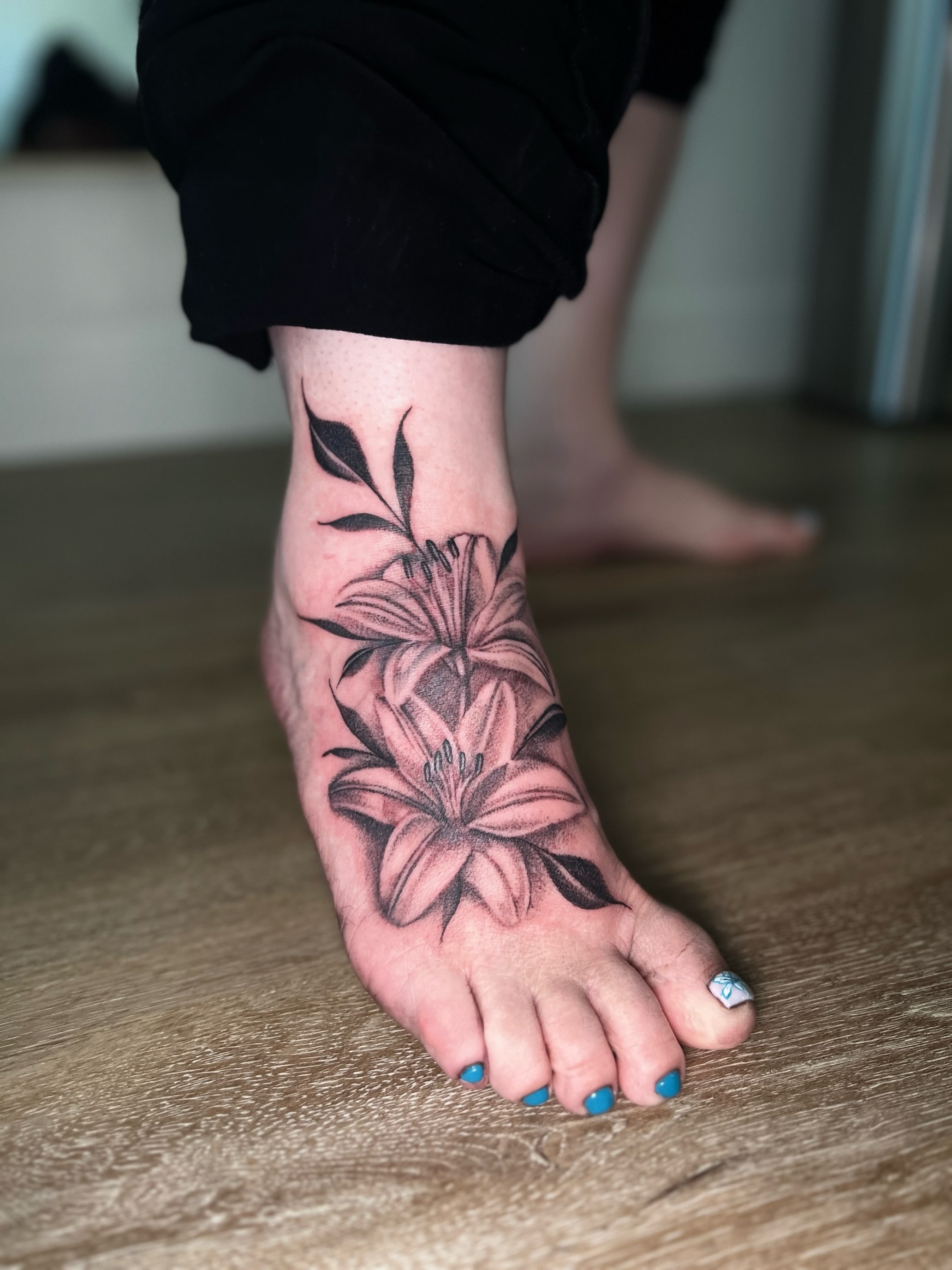 Lily black and grey tattoo on the foot by ππππππ ππππππ - ππππ‘ππ₯ ππ¨π₯π’πππ«π’π¨π¬ π΅π