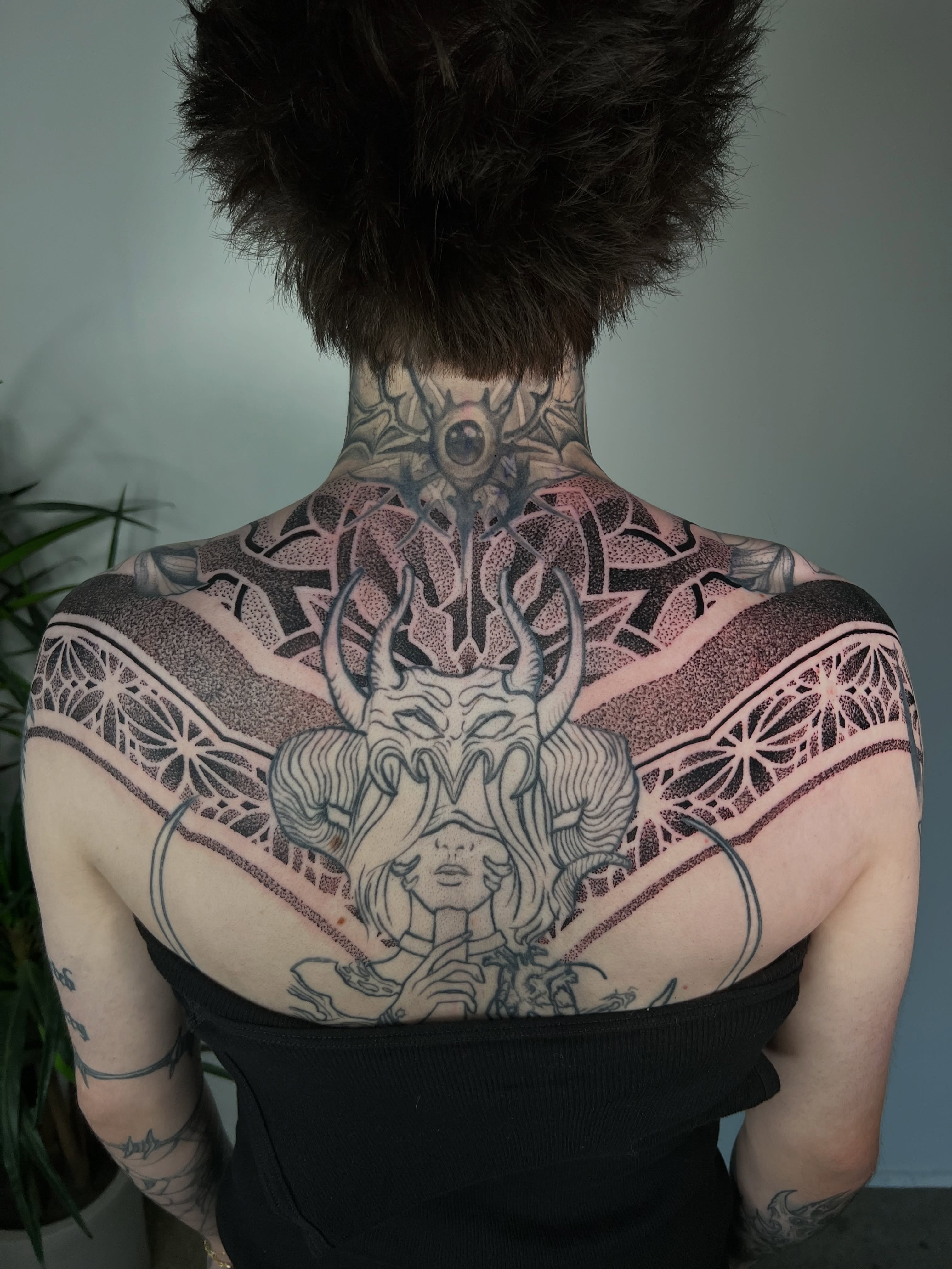 Bull head dotwork tattoo on the back by Riley